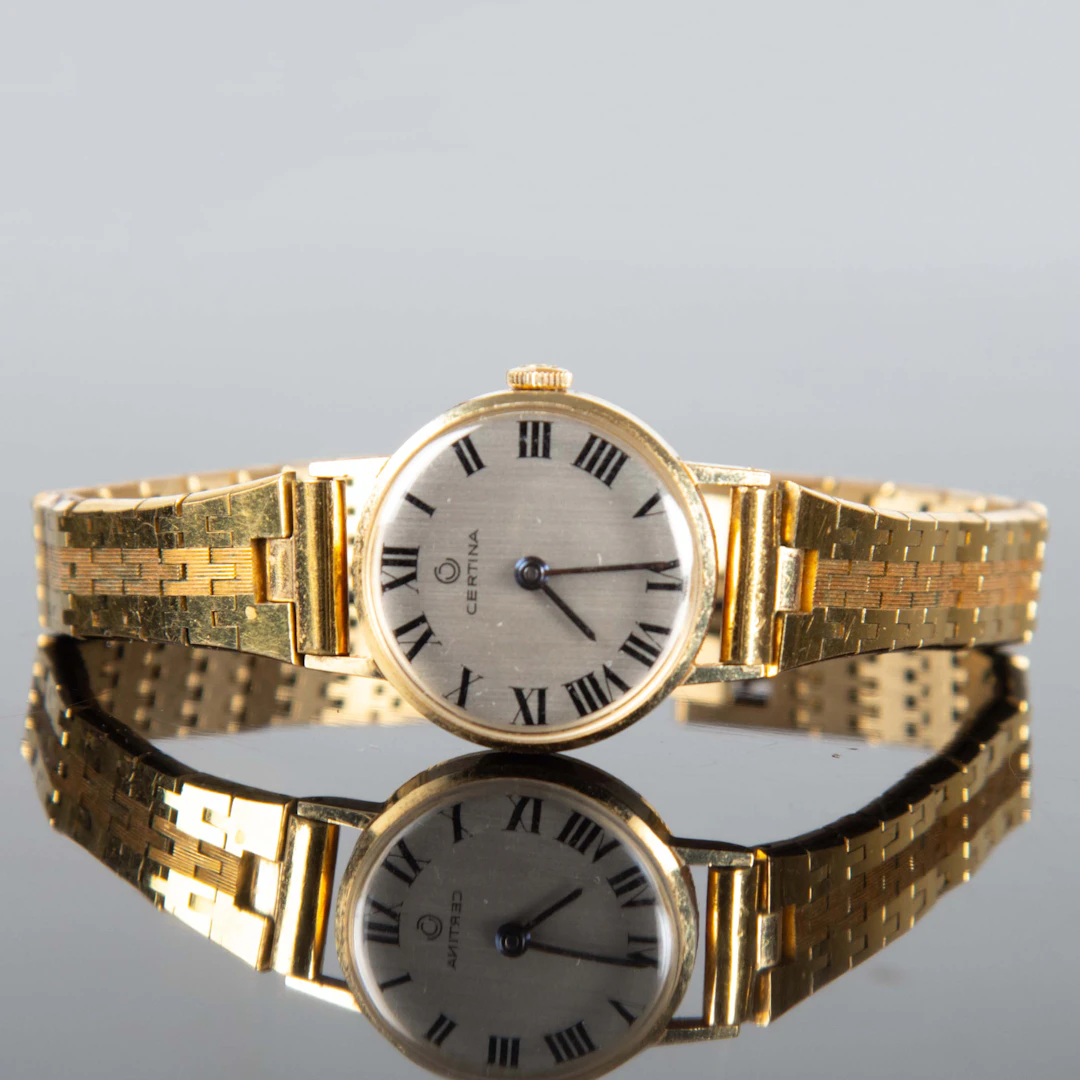 ARMBANDSUR CERTINA 14K . Armband i gulmetall.