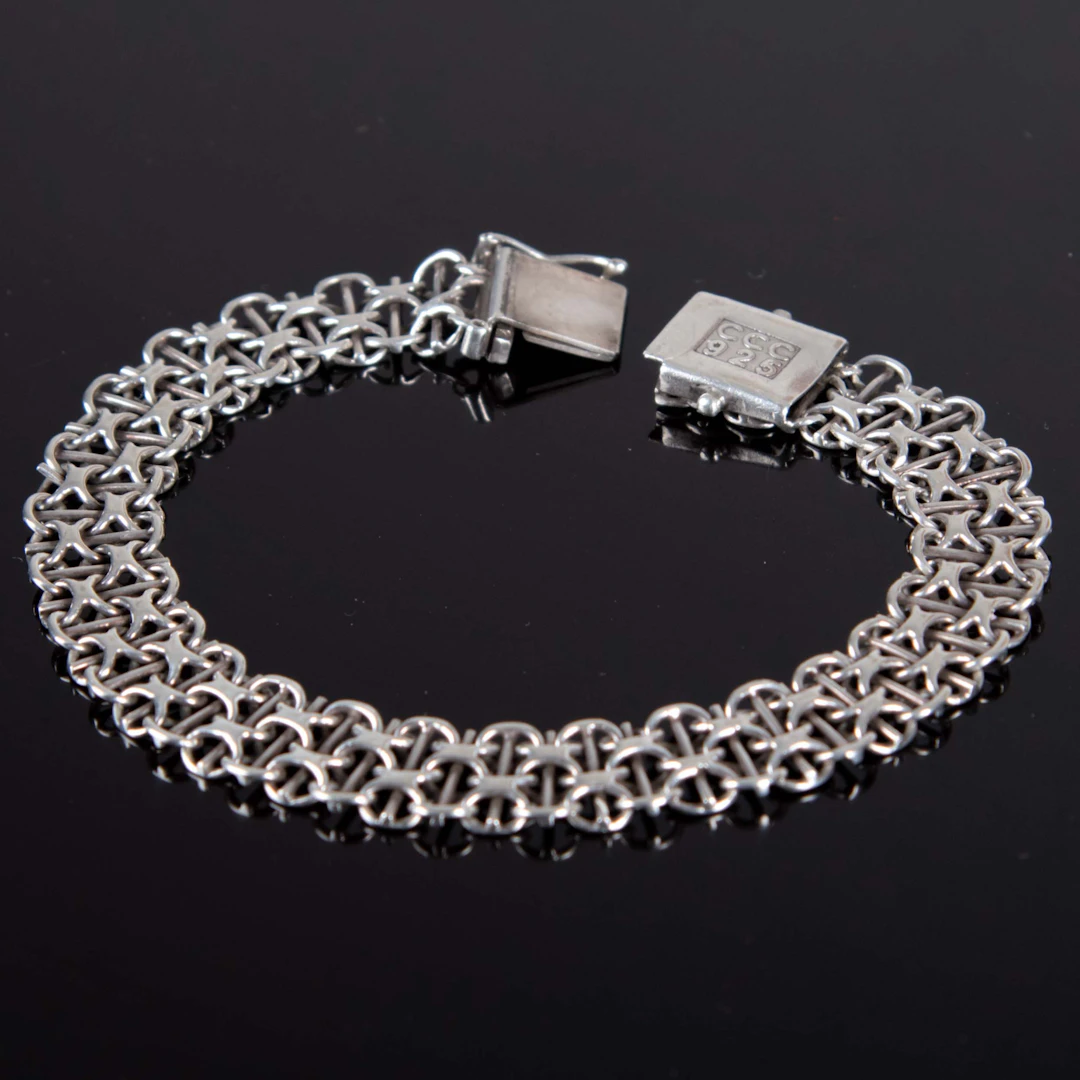 ARMBAND. X-länk, silver.
