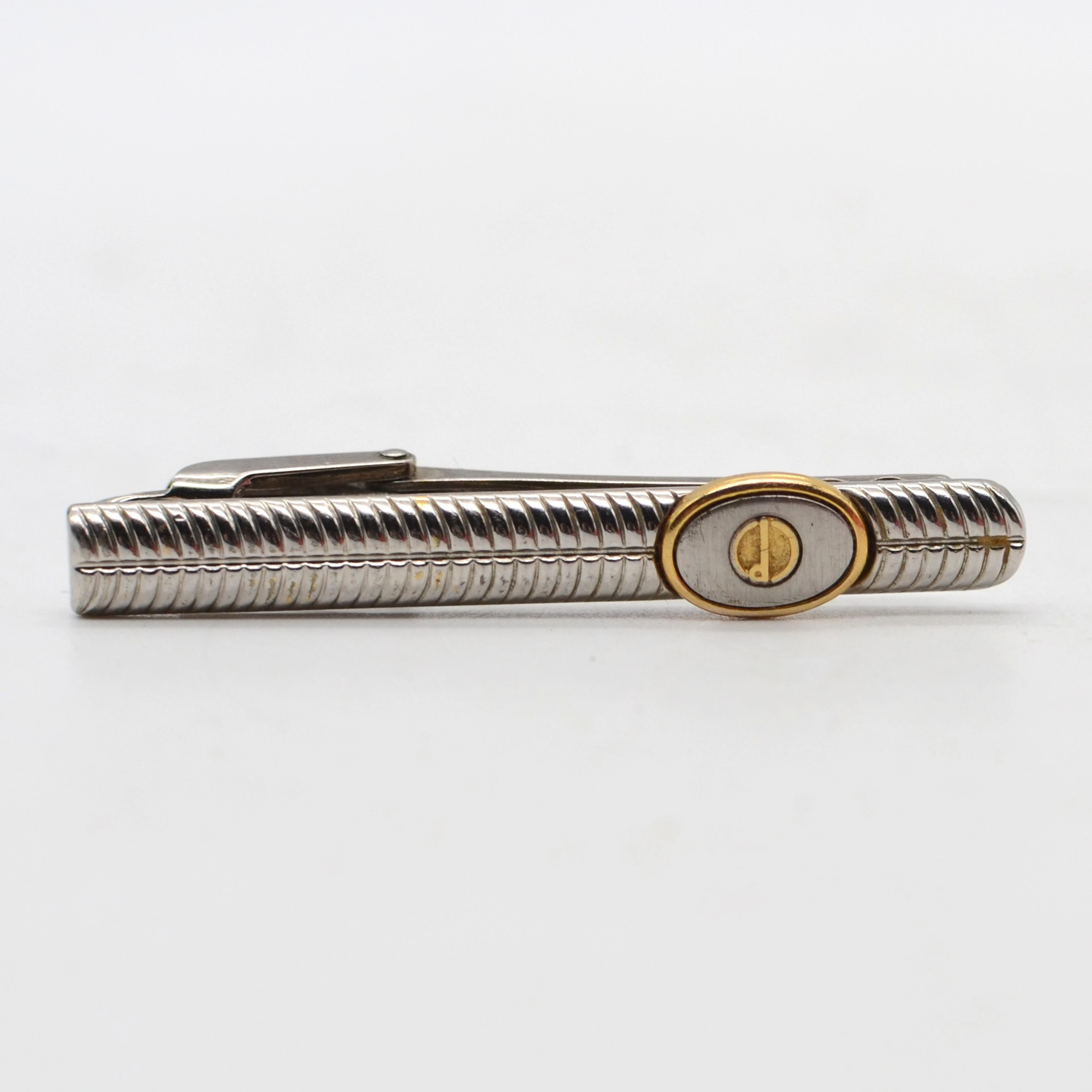 ALFRED DUNHILL. DESIGNER-KRAWATTENKLAMMER, METALL, VERSILBERT UND