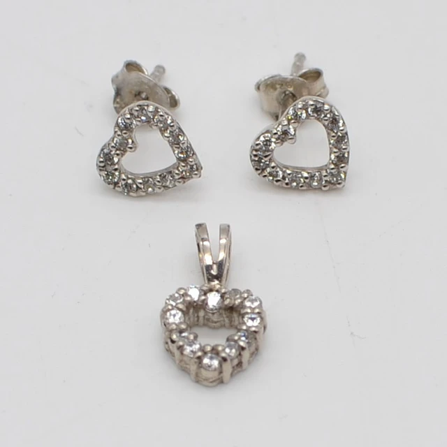 LUND COPENHAGEN, EIN SET AUS OHRCLIPS UND ANHÄNGER, STERLINGSILBER