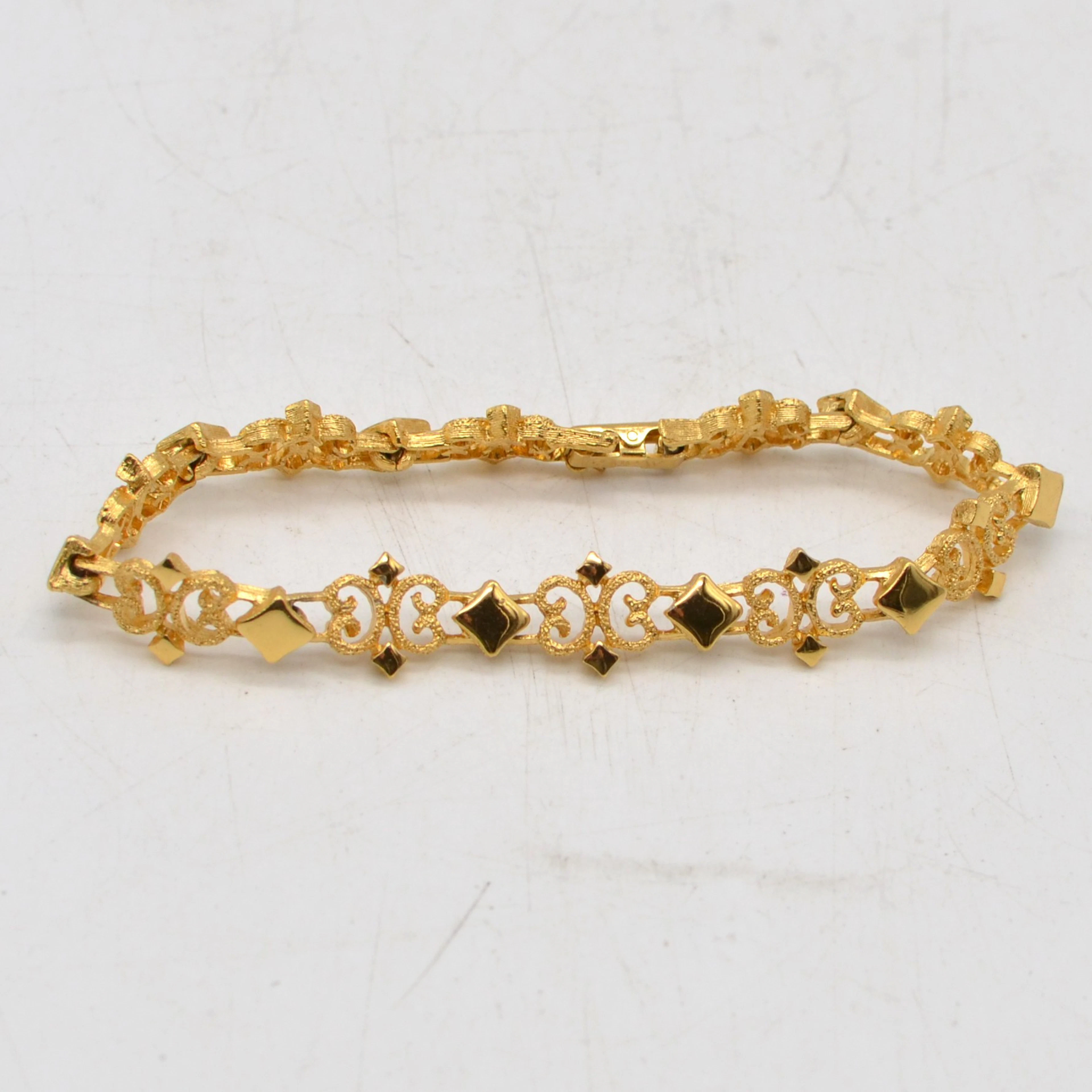AVON, MODESCHMUCK GLIEDERARMBAND, VERGOLDETE FANTASIEKETTE, UM 2000.