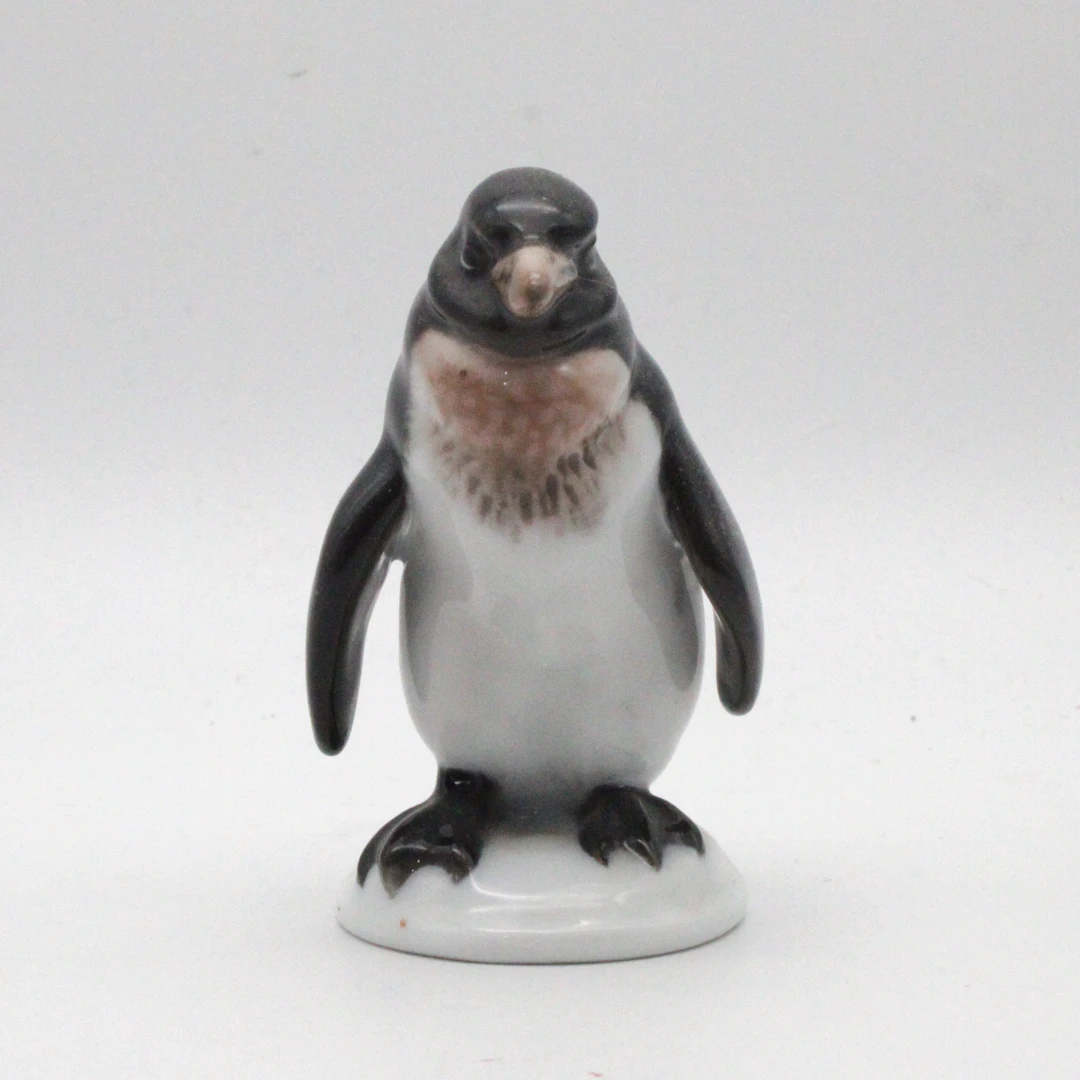 ROSENTHAL PORZELLANFIGUR PINGUIN, HANDBEMALT, K.HIMMELSTOSS, 1950ER JAHRE.