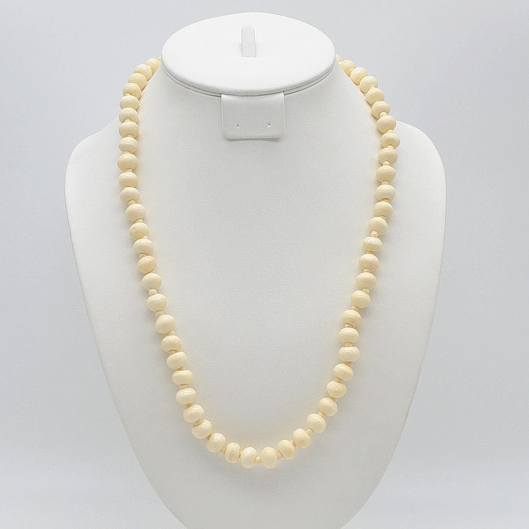 COLLIER AUS KNOCHENPERLEN, HANDGEMACHT, 1950ER JAHRE, CA. 60CM.
