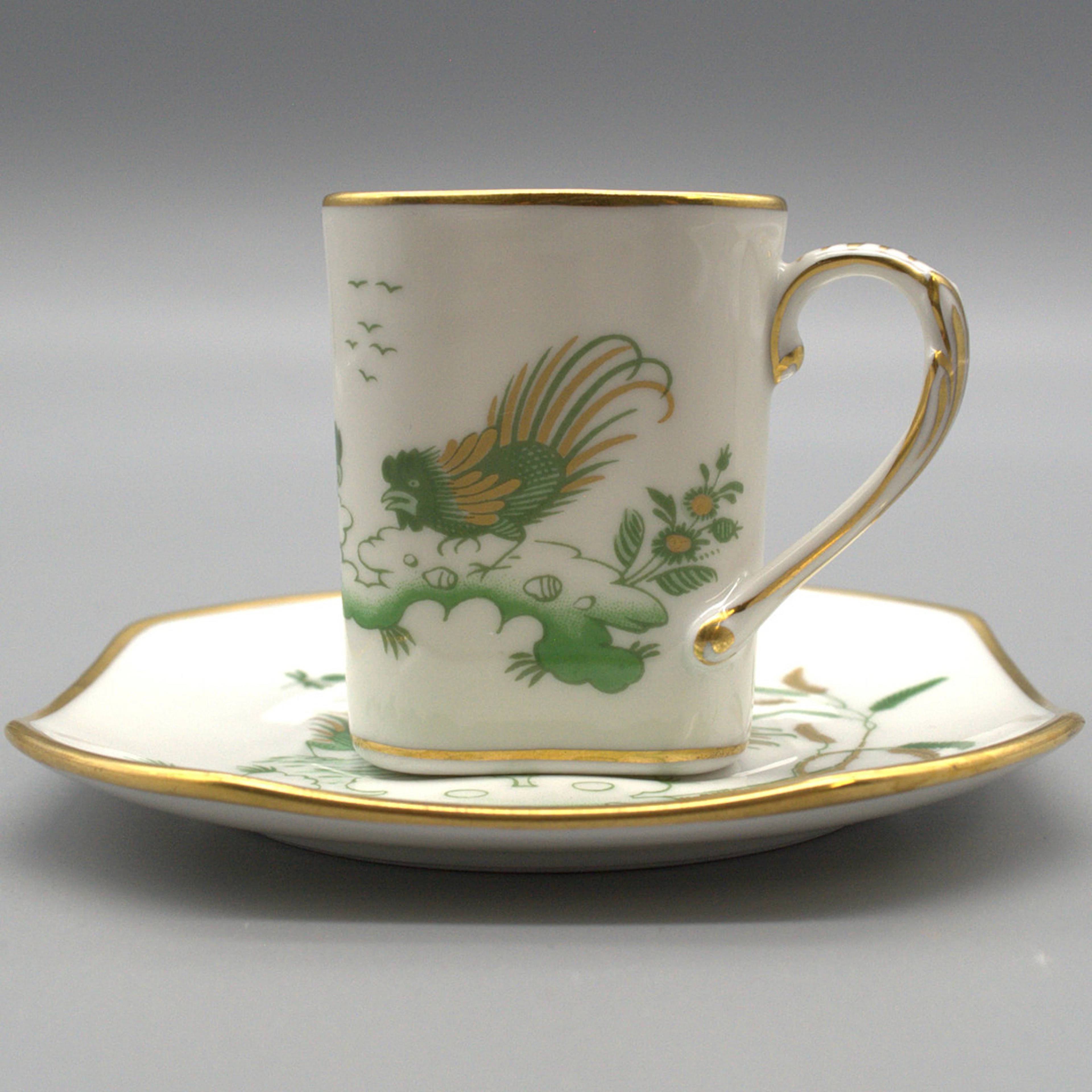 RICHARD GINORI. SET AUS TASSE UND UNTERTASSE, HANDBEMALT MIT GOLDRAND