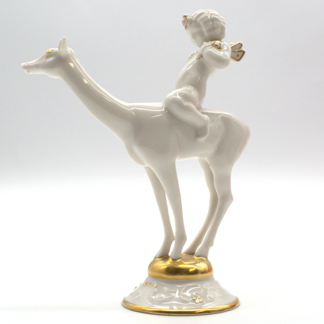 KARL TUTTER. FÜR HUTSCHENREUTHER "IDYLL" PUTTO AUF REH REITEND, GOLD