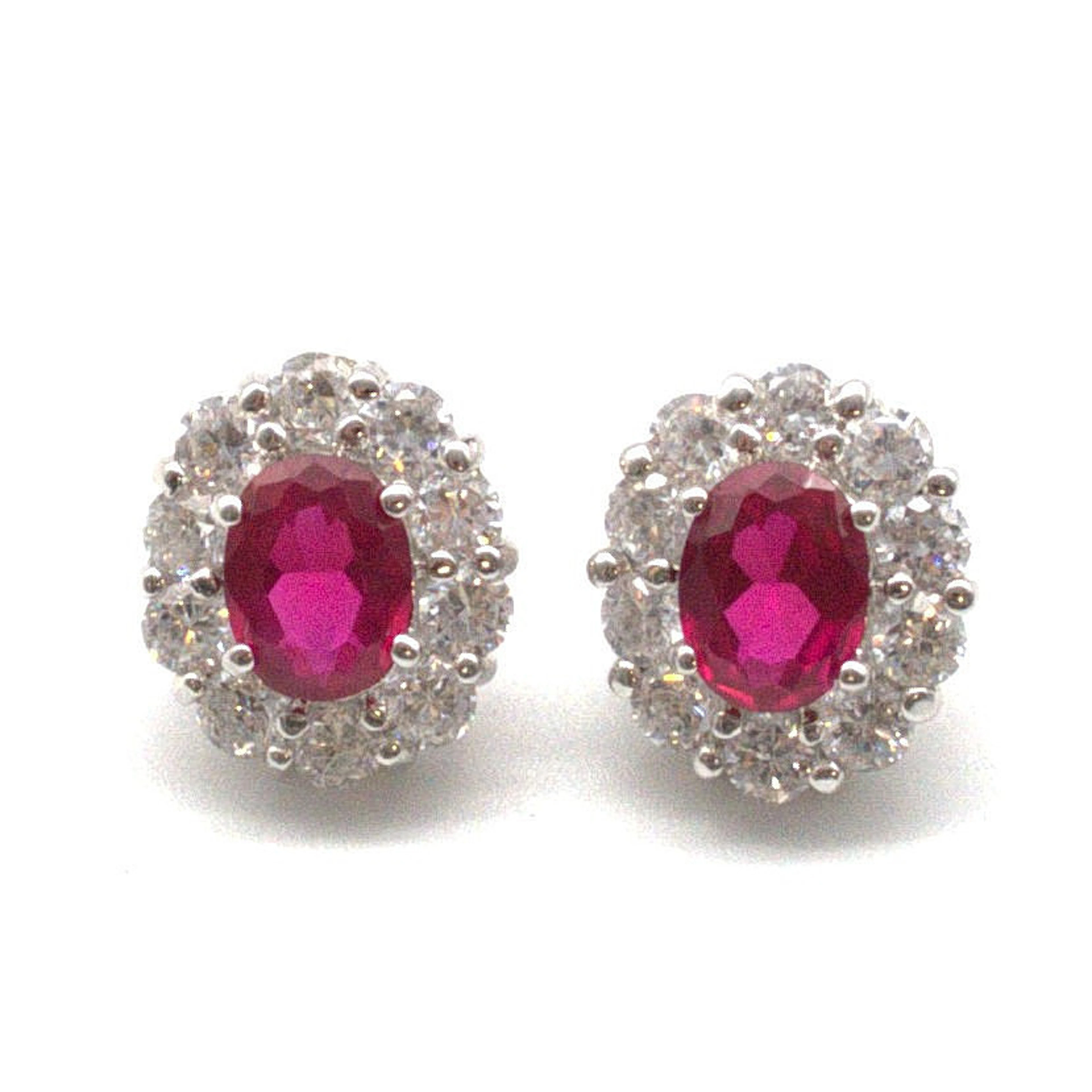 CHRISTIAN&IBANA. RUBINOHRSTECKER CA. 3KT. ARTDECOT STIL IN HANDARBEIT.