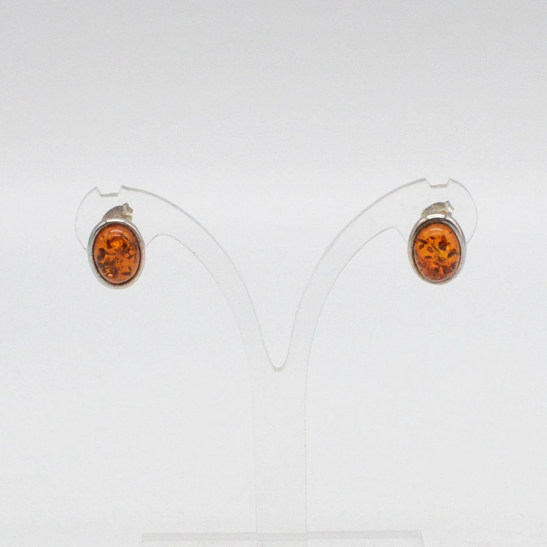 DAVID SIGAL. DESIGNER OHRSTECKER MIT BERNSTEIN CABOCHON (MIT BLATTEINSCHLÜSSE)
