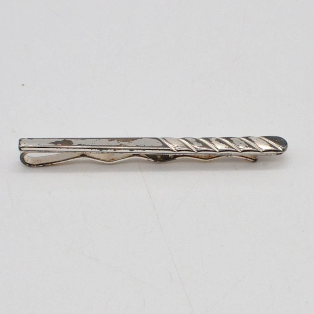 ORDAHL ANDERSEN. DESIGNER KRAWATTENHALTER, STERLINGSILBER MIT VERSILBERTEM