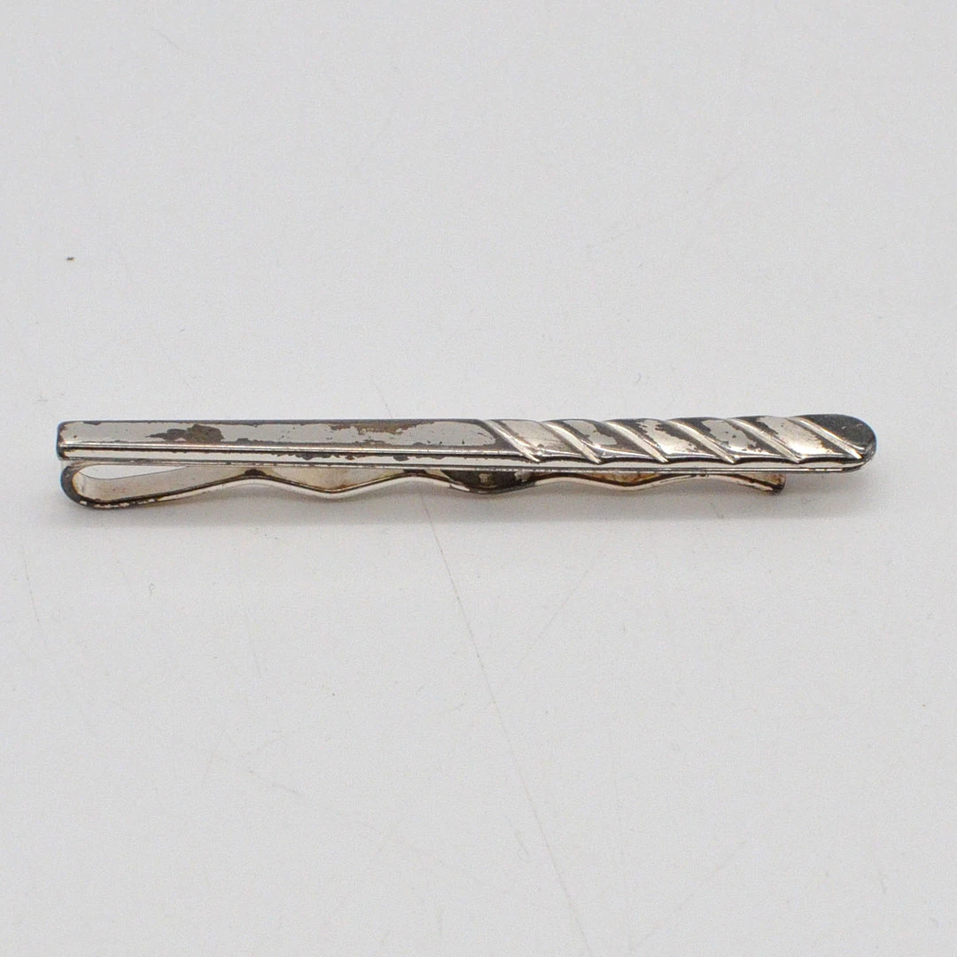 ORDAHL ANDERSEN. DESIGNER KRAWATTENHALTER, STERLINGSILBER MIT VERSILBERTEM