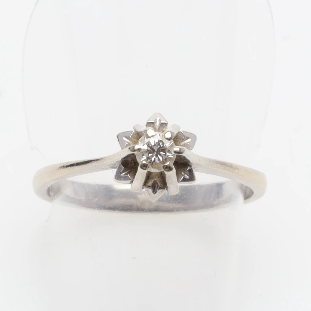 RING 18K vitguld med diamant 1 x ca 0,14ct bruttovikt 2,9 gram.