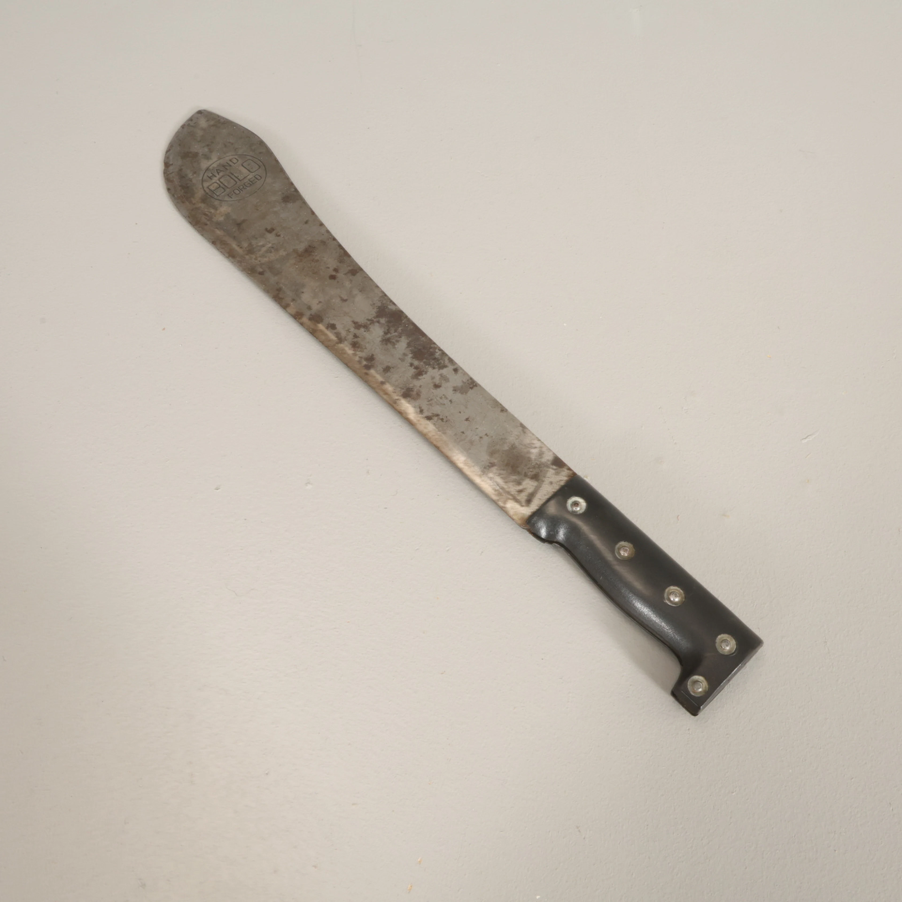MACHETE bladet märkt 'Bolo Hand Forged'.