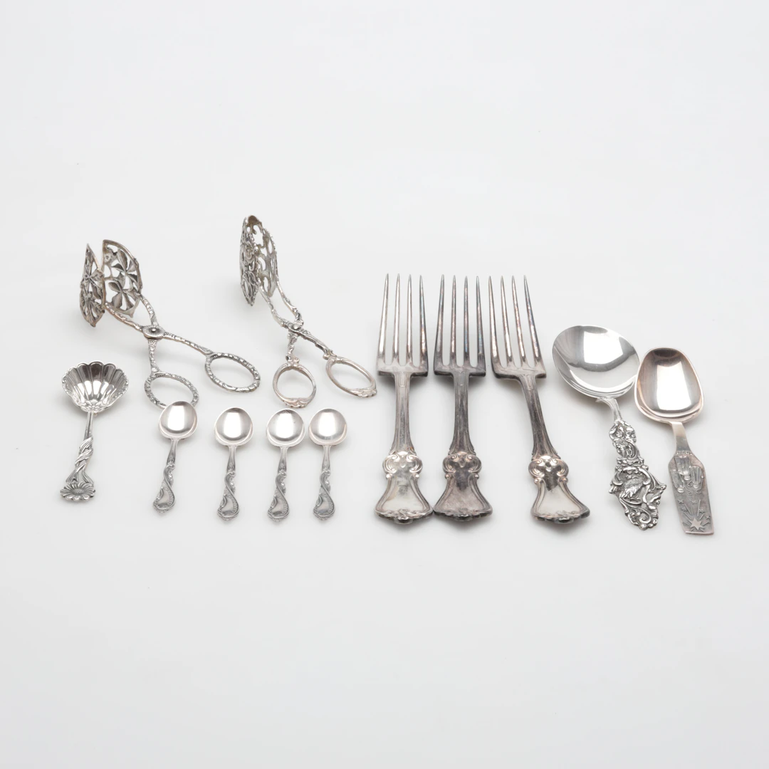 BESTICK 12 delar silver olika modeller vikt ca 389 gram.