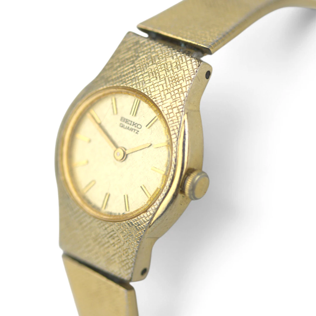 SEIKO. Armbandsur, dam, guld på stål, quartz, vintage från 1980-talet, Japan.
