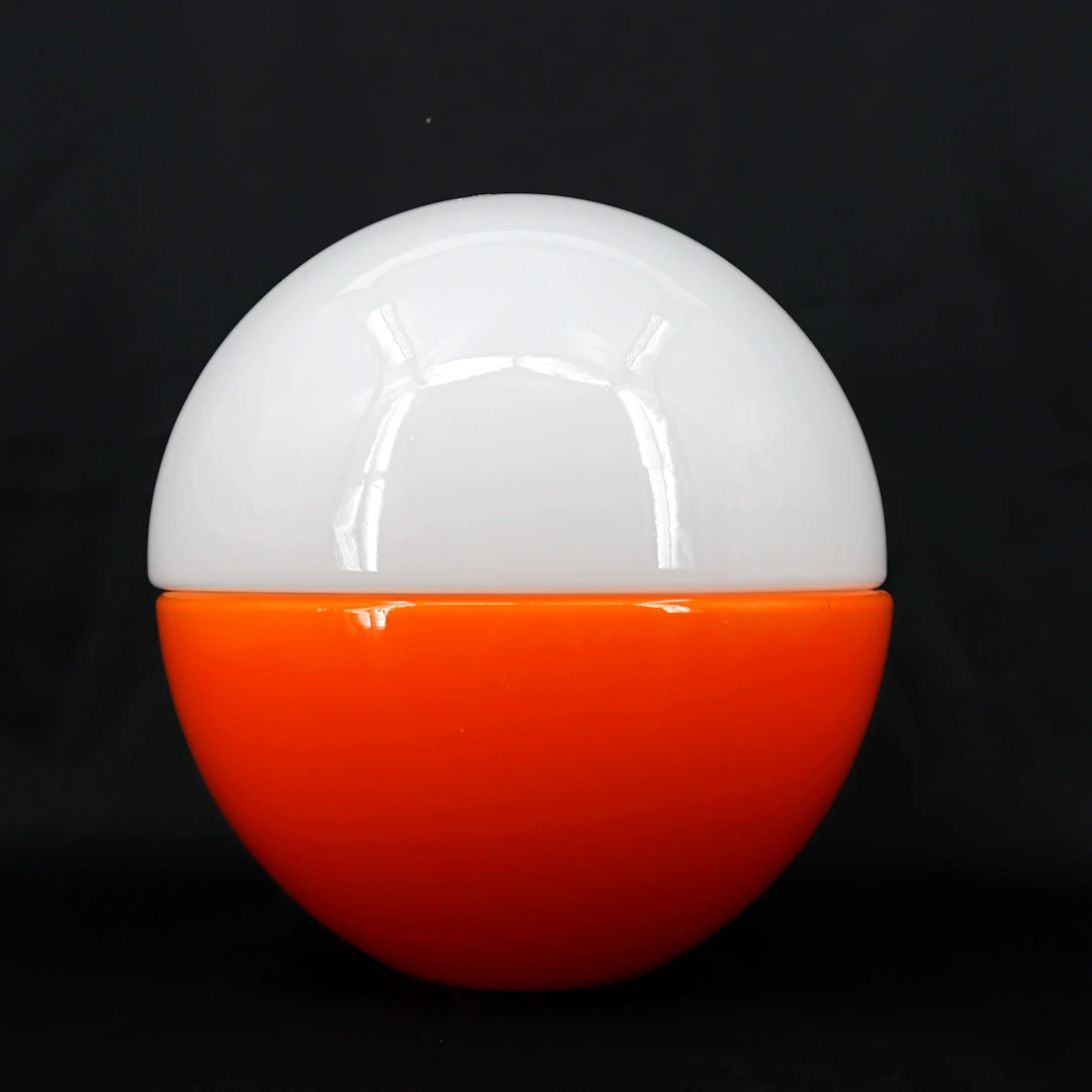 BORDSLAMPA, klotform, två delad, underdel av orange glas överdel av