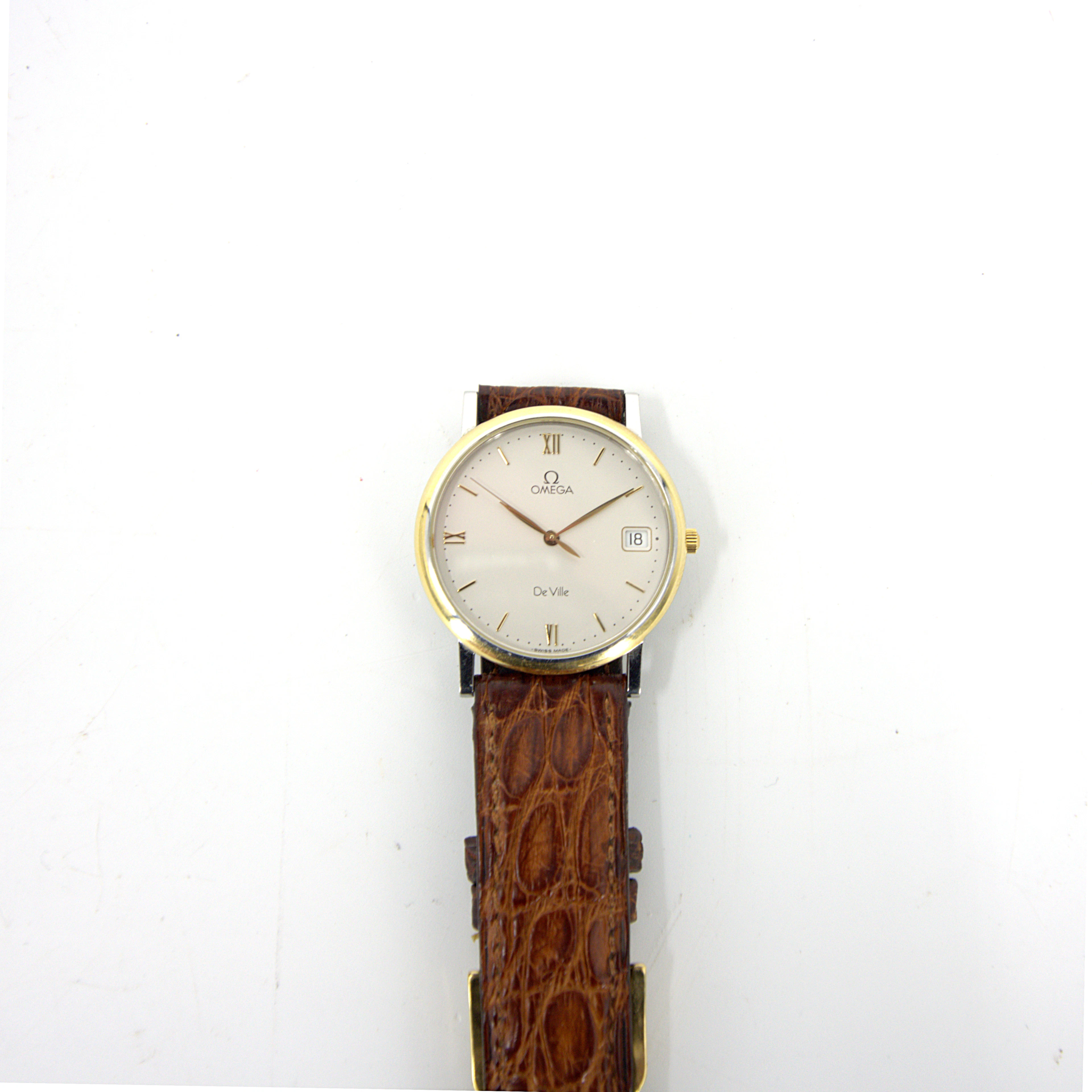 OMEGA. De Ville, armbandsur, guld på stål, quartz, läderarmband Omega