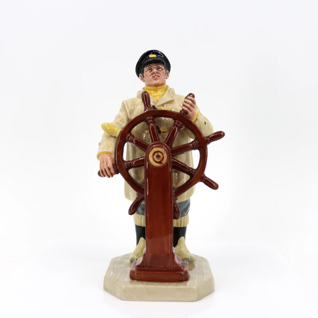 MARY NICOLL. Figurin, "The Helmsman", benporslin, märkt HN 2499, Royal