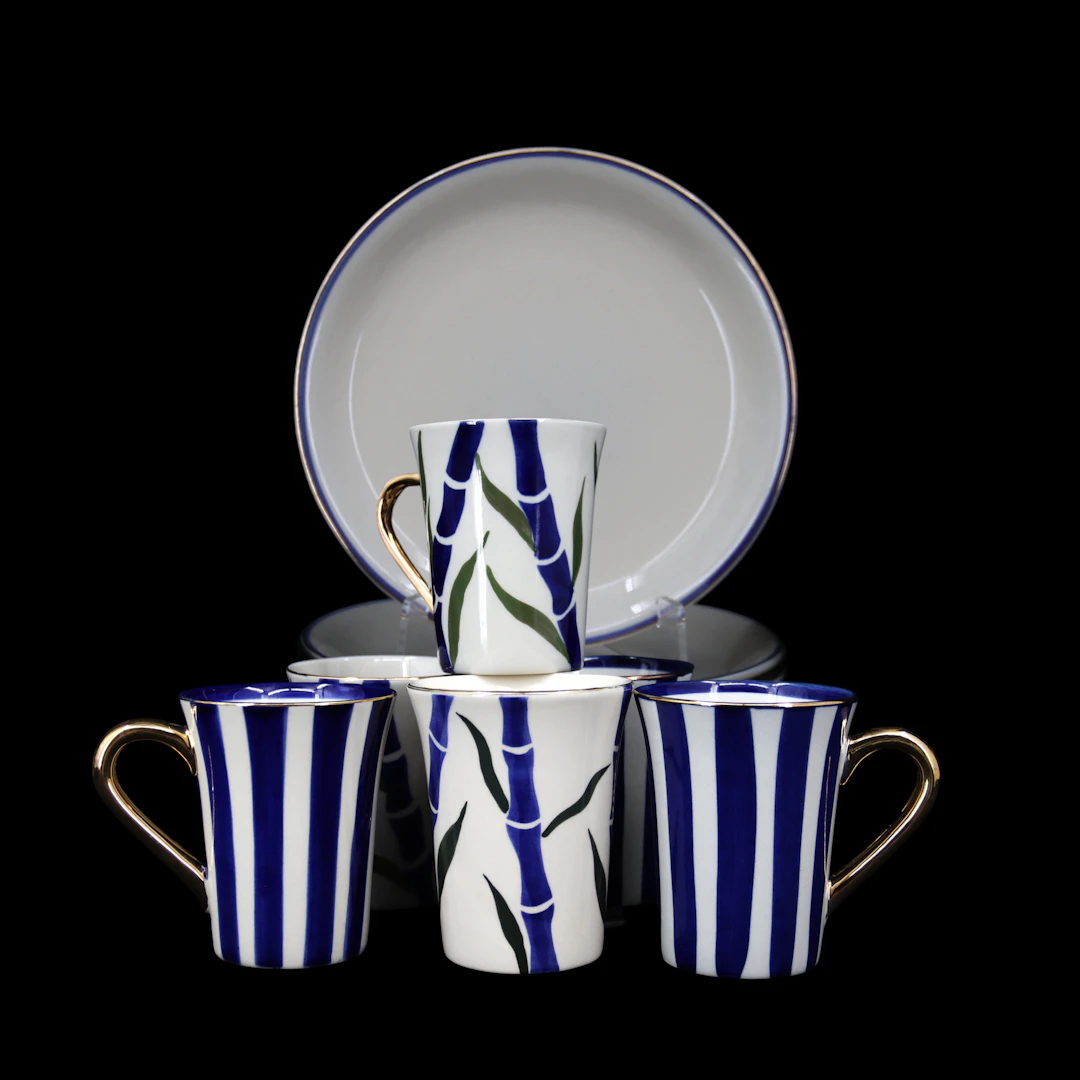 KERSTIN TILLBERG. Kaffemuggar + assietter, 6 + 6 delar, glaserat stengods