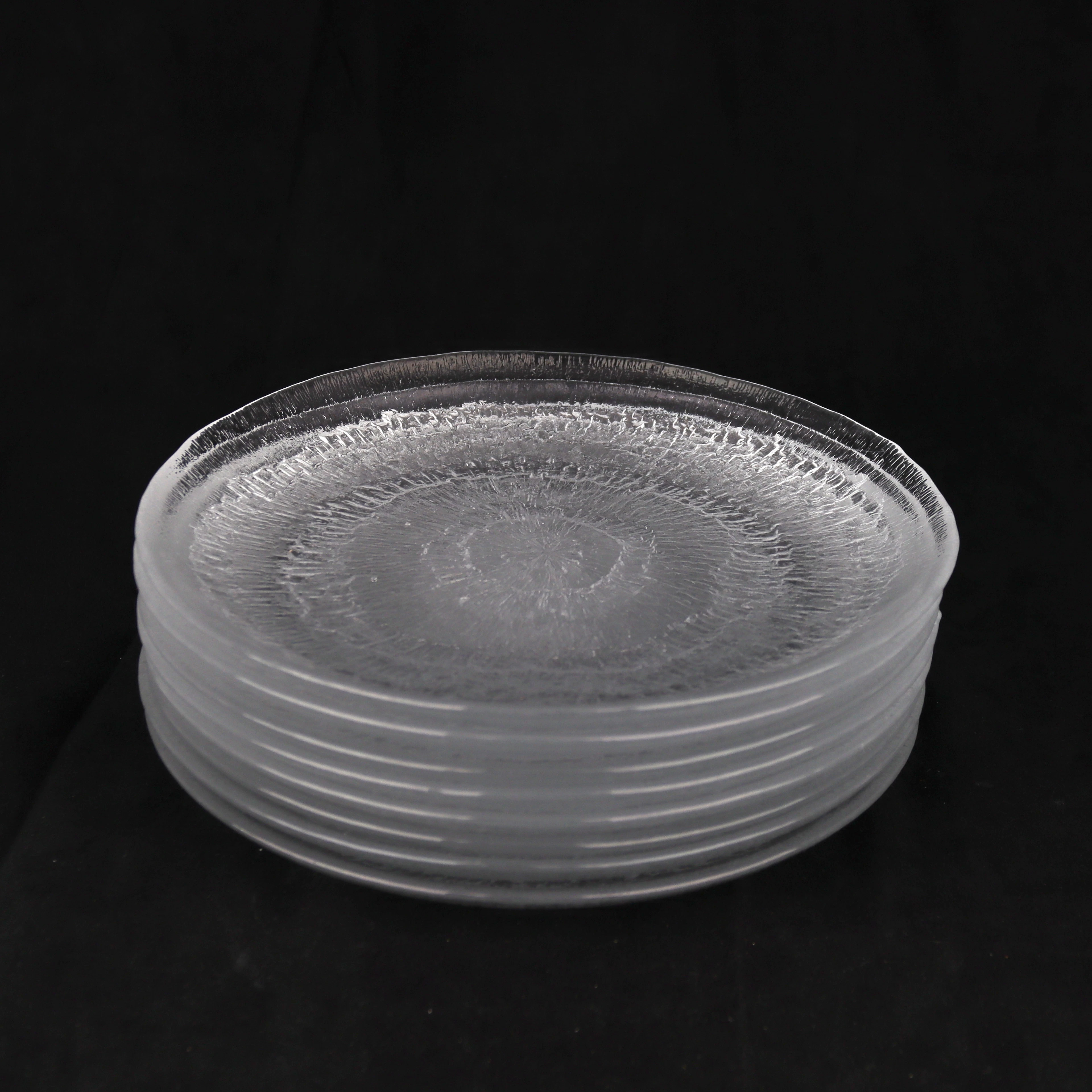 TAPIO WIRKKALA. Assietter, 8 st, "Solaris", glas, Iittala, Finland.