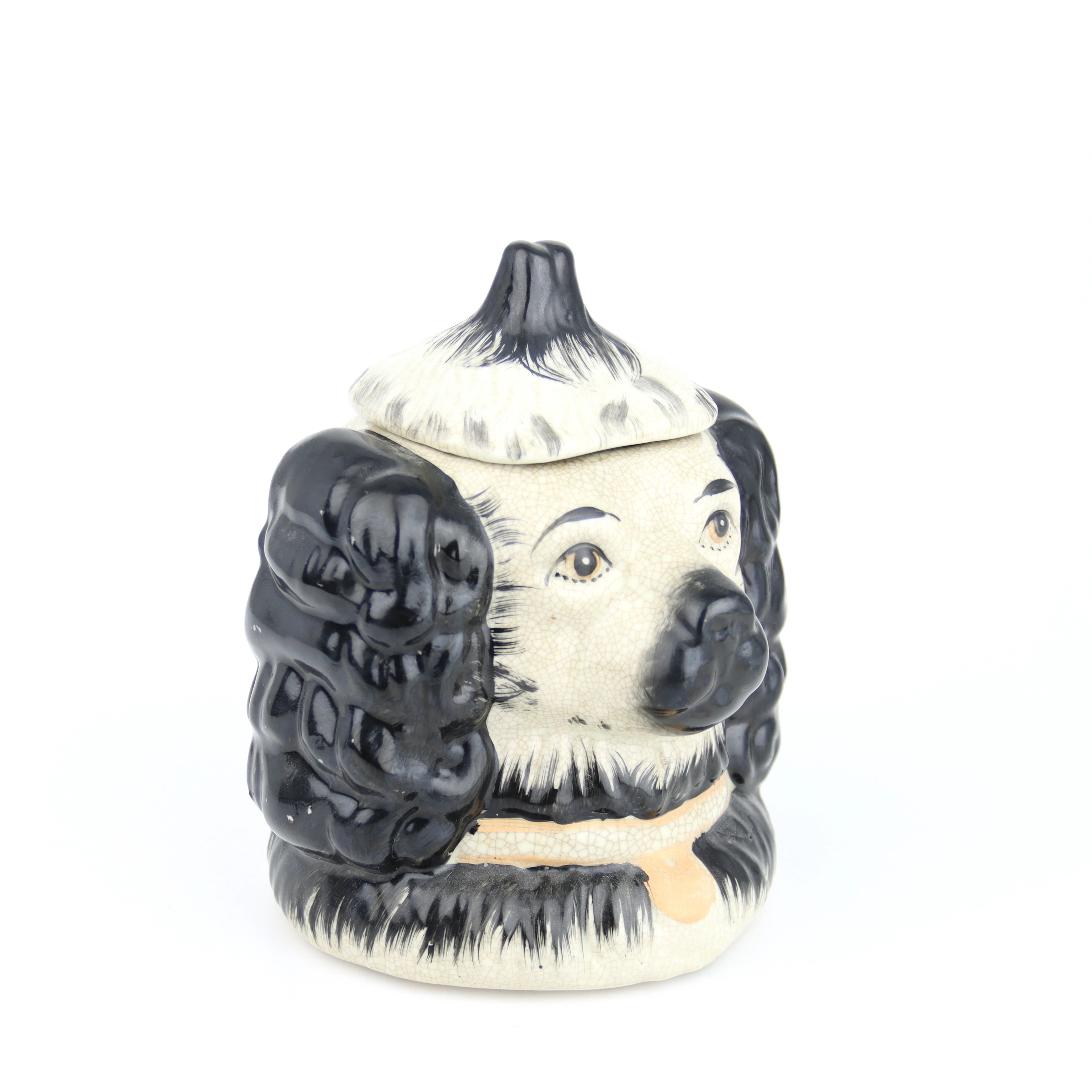 TOBAKSBURK i form av en hund, porslin, Staffordshire-stil, 1900-tal.