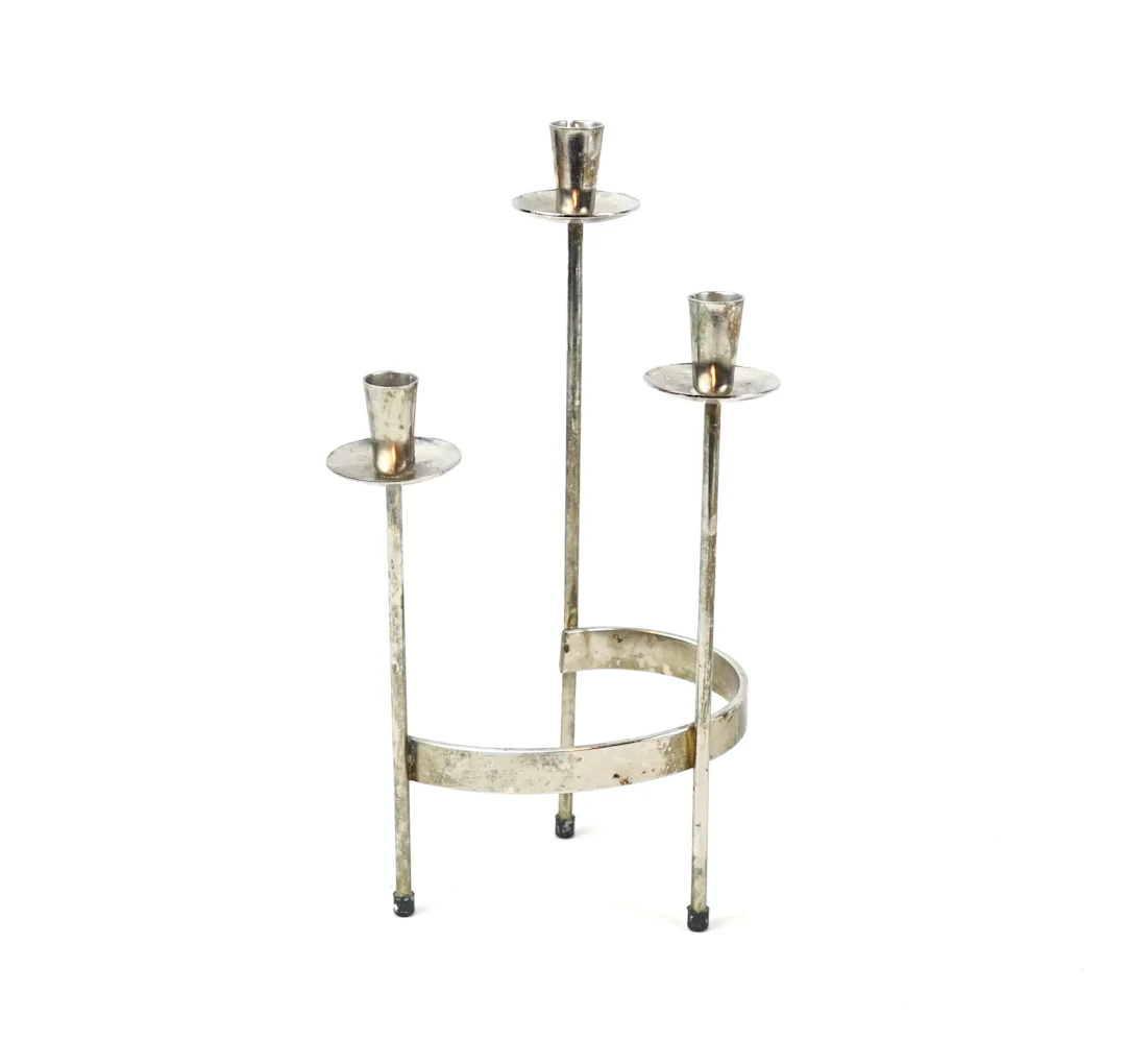 Gunnar Ander, a metal candlestick.