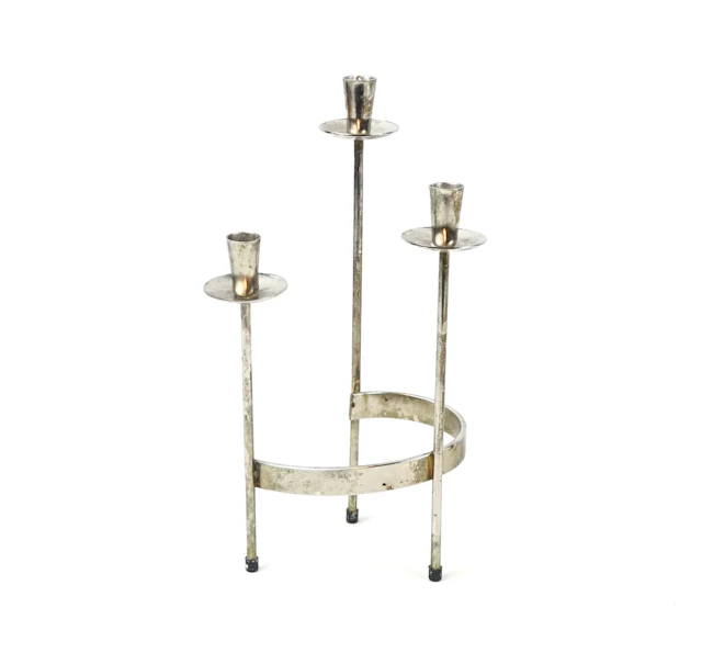 Gunnar Ander, a metal candlestick.