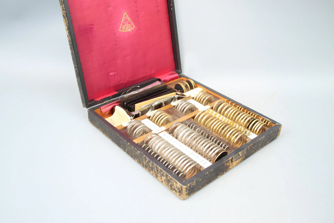 Opticians box with trial lenses, KIFA.