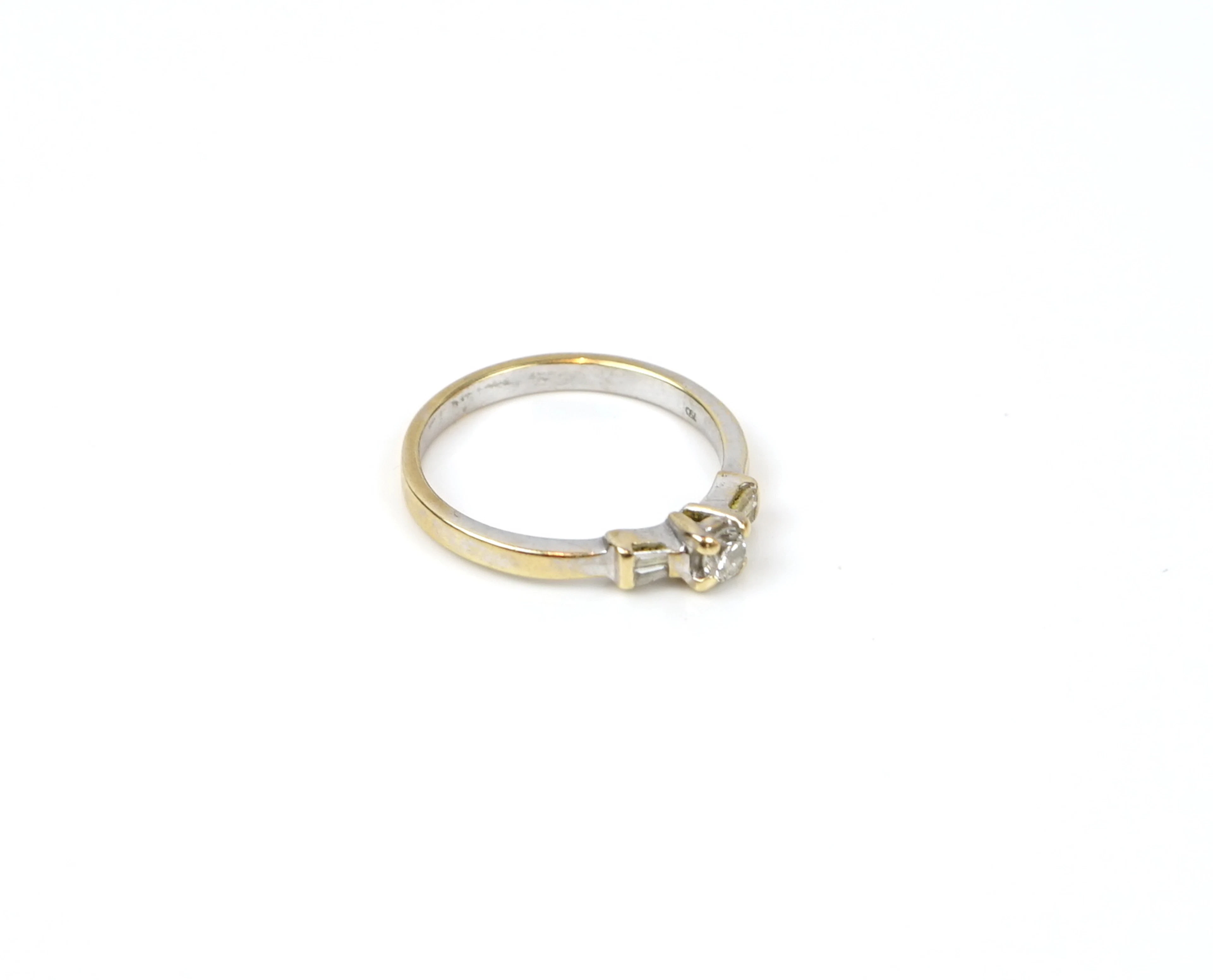 Ring, 18K rhodium-plated gold with a brilliant-cut and 4 baguette-cut