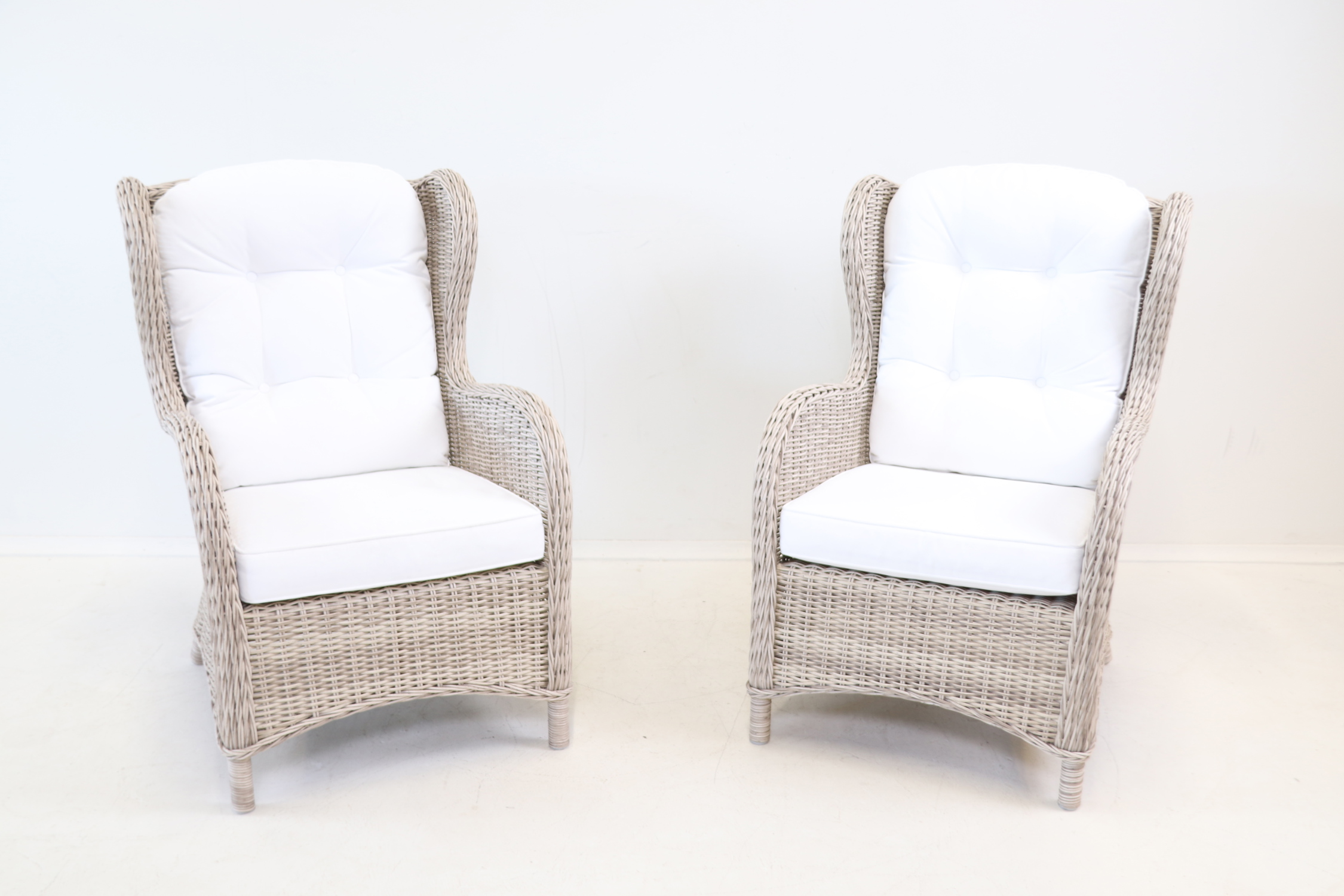 Sillones, un par, de ratán/textil, Brafab.