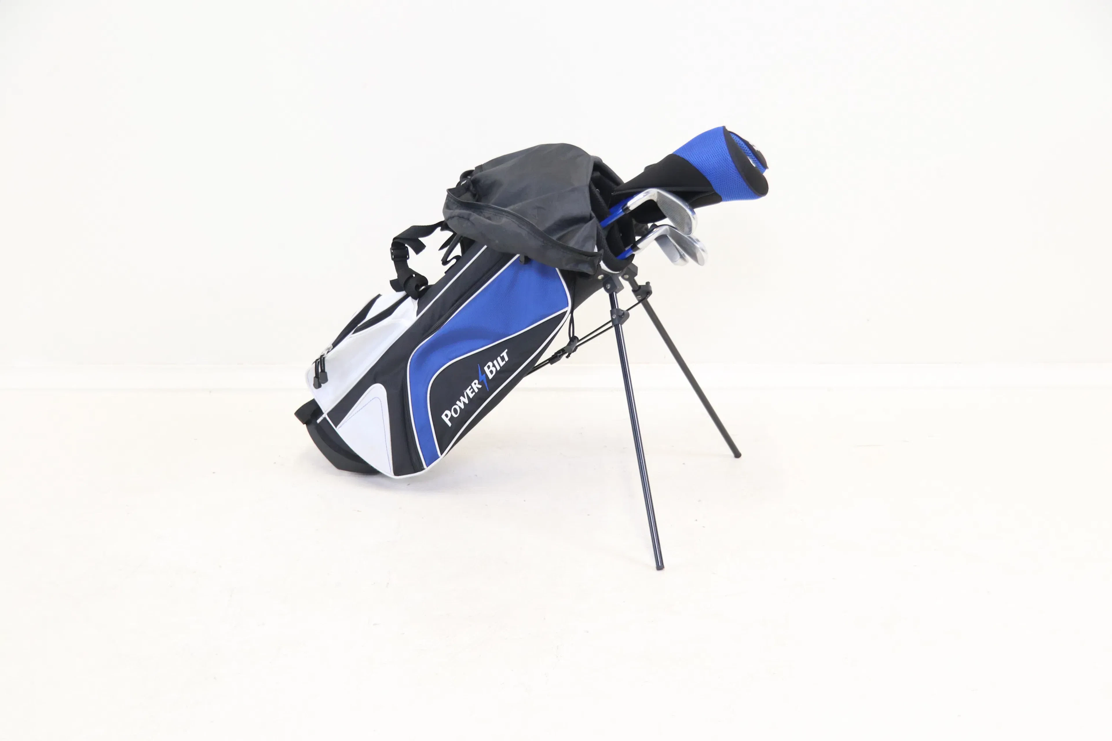 Palos de golf, para 6-8 años, y bolsa de golf.