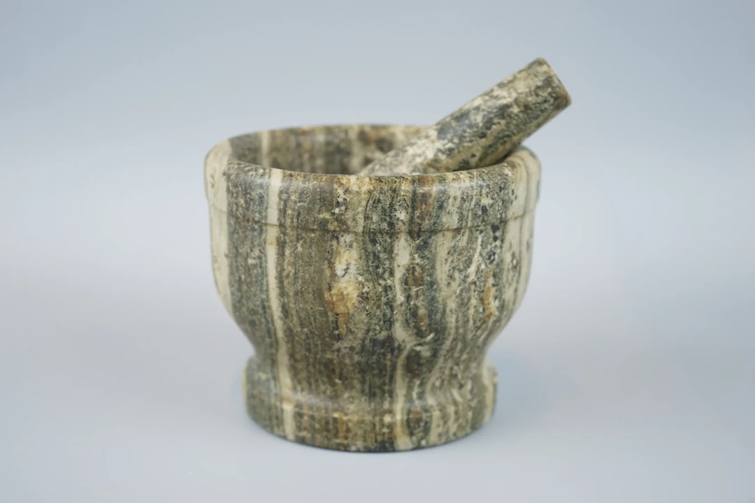 Mortar with pestle, Kolmård marble.