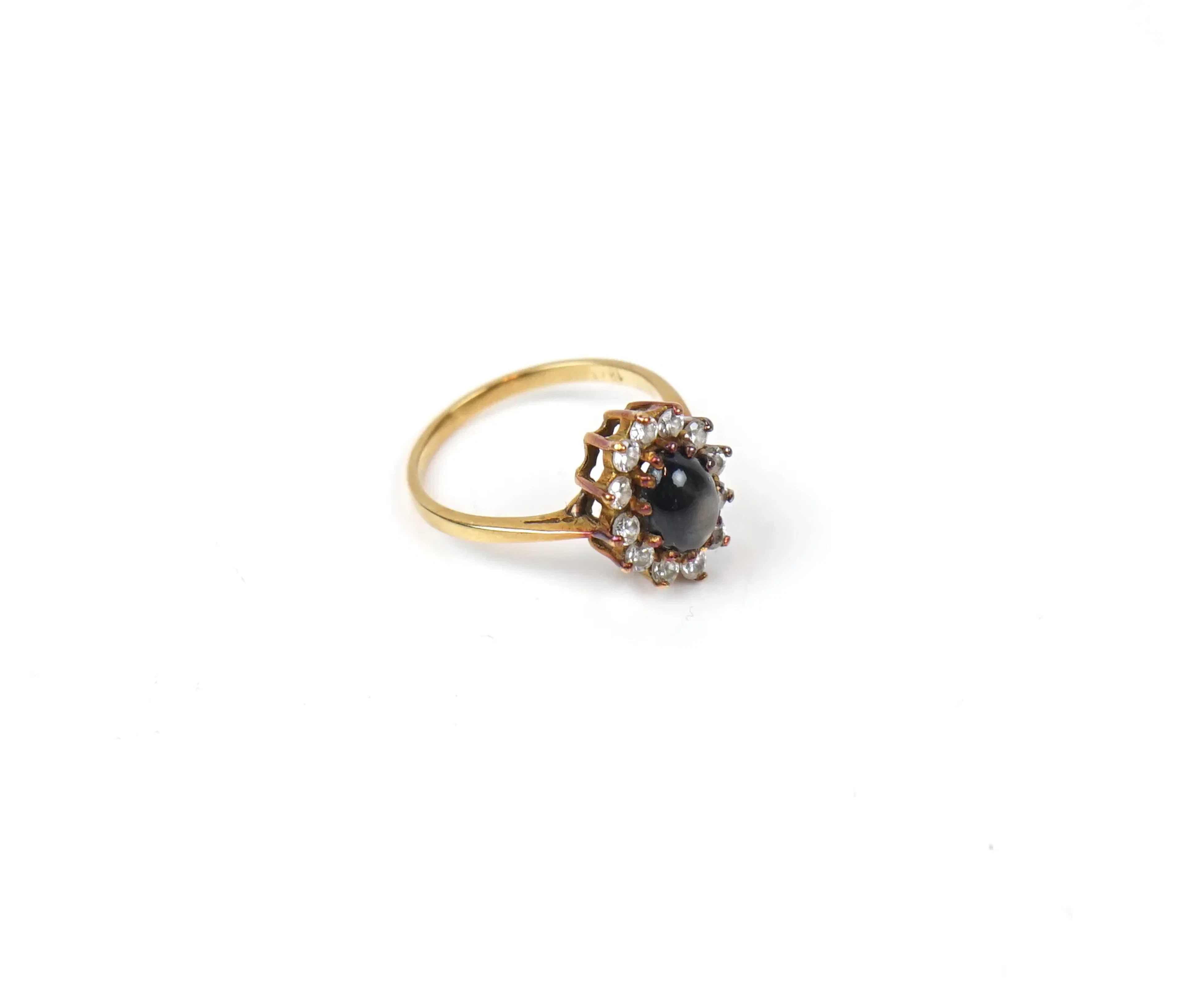 Anillo, carmose con topacio ahumado y cuarzo, oro 18K.