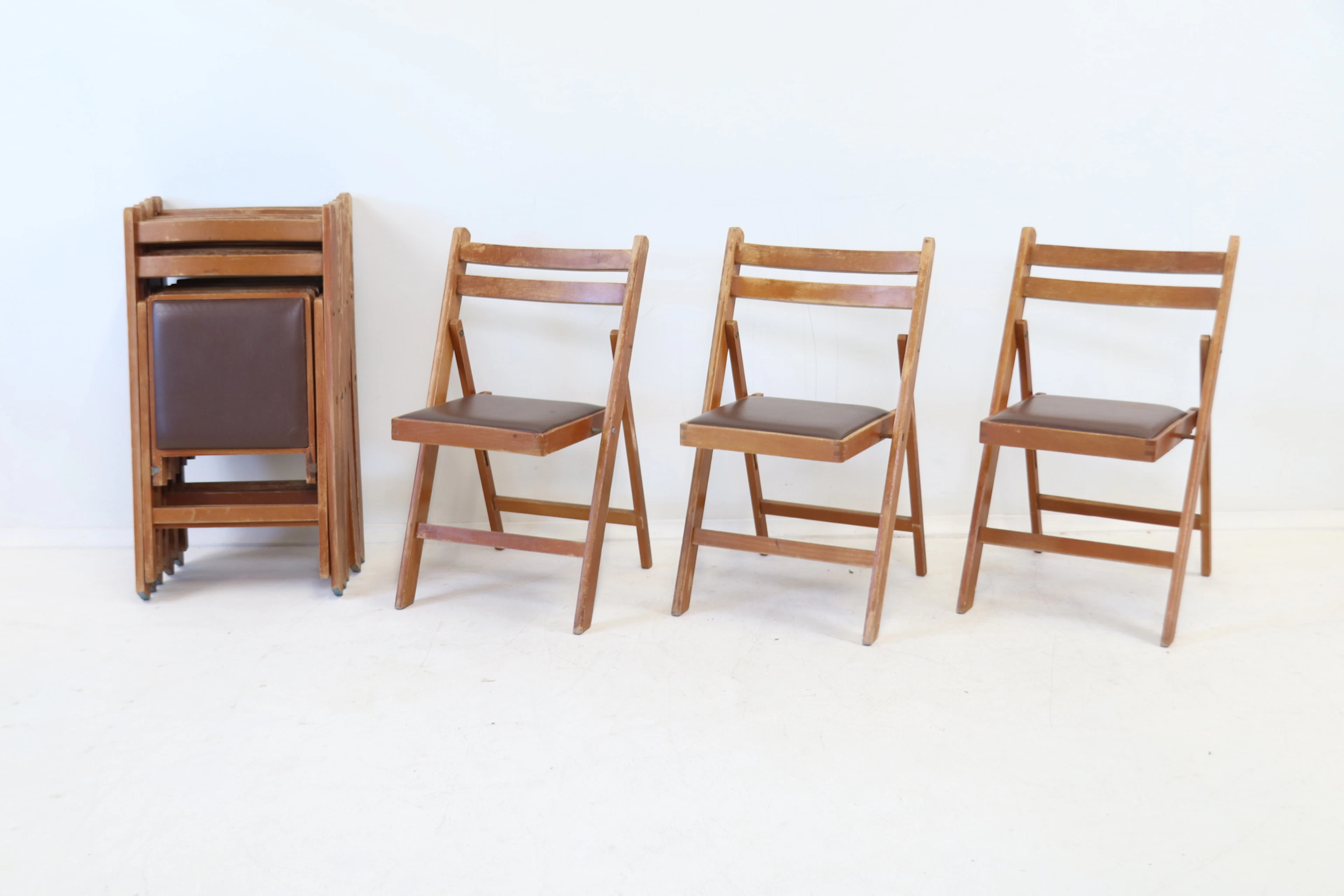 Chaises pliantes, 8 pièces, bois/cuir synthétique.