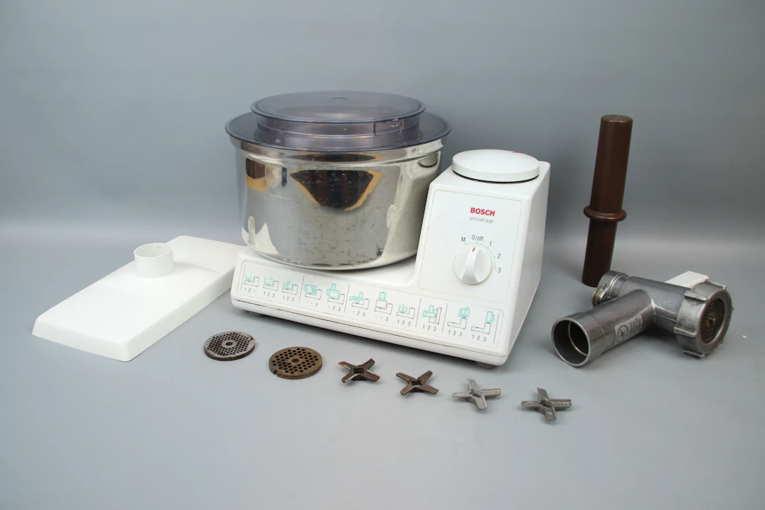 Bosch Universal UM60ST2 stand mixer with accessories.