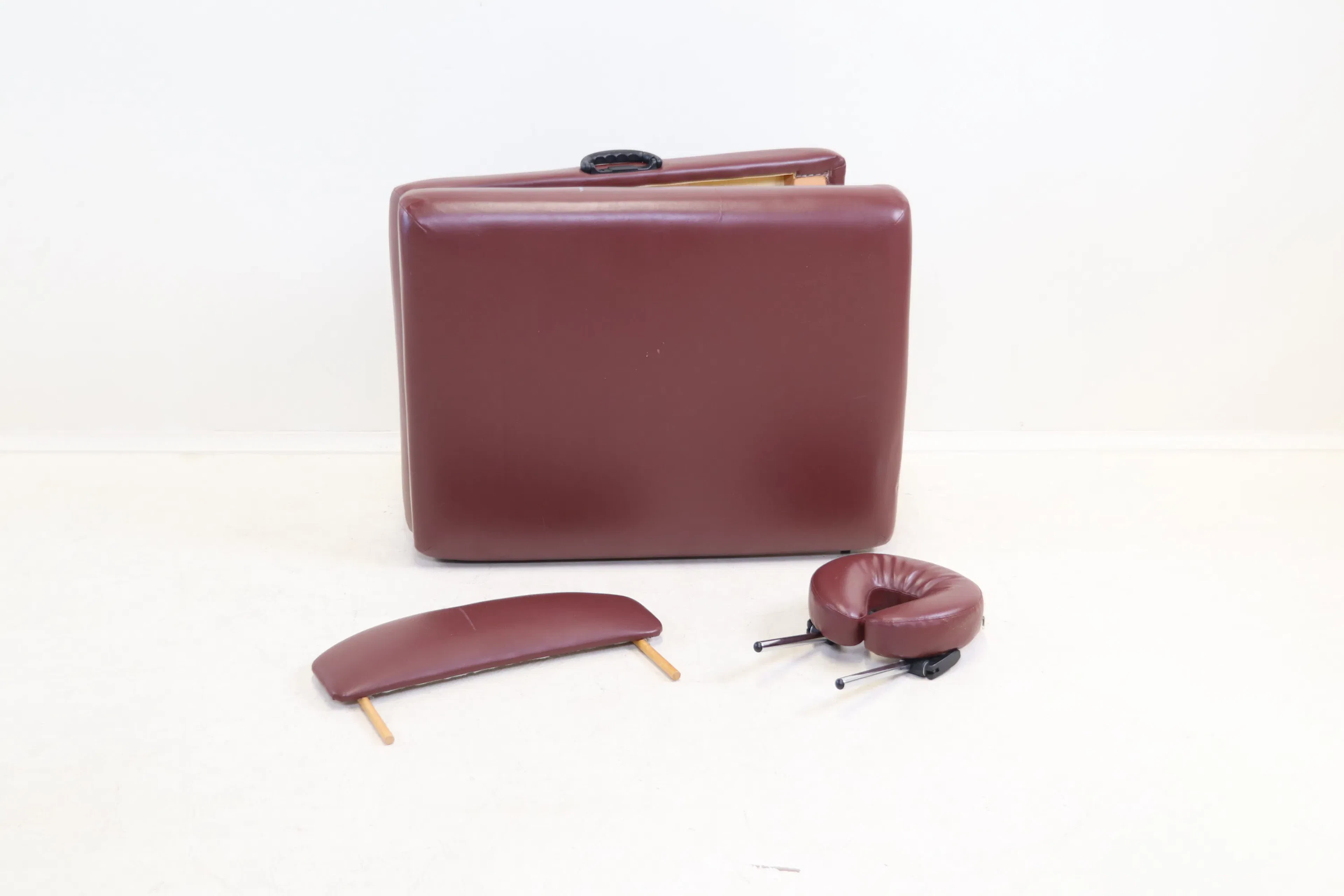 Massage table, foldable, faux leather/wood/metal.
