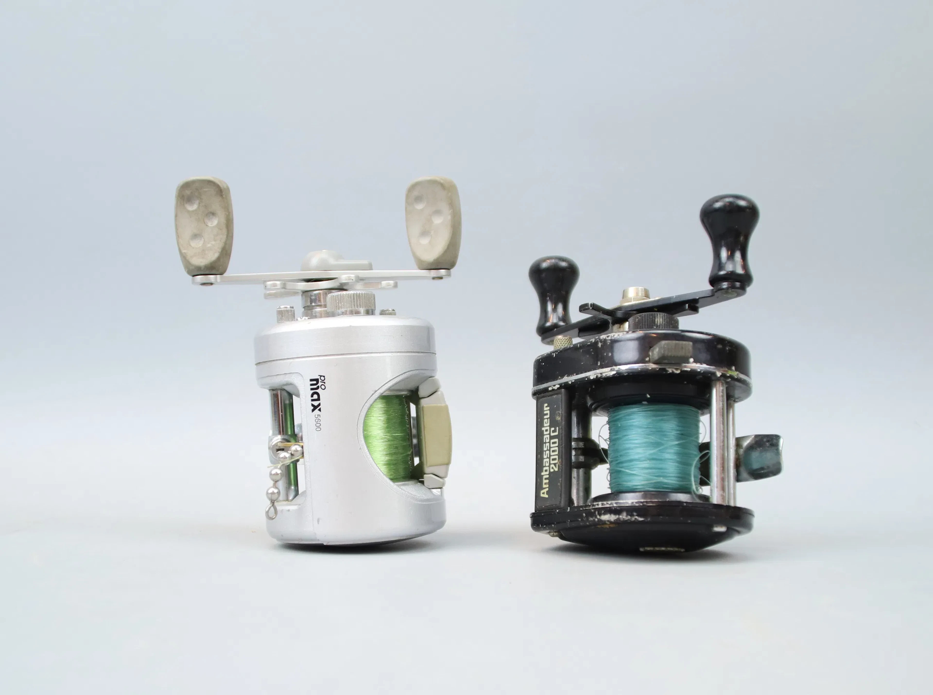 Fishing reels, so-called multi reels, 2pcs, metal, ABU.