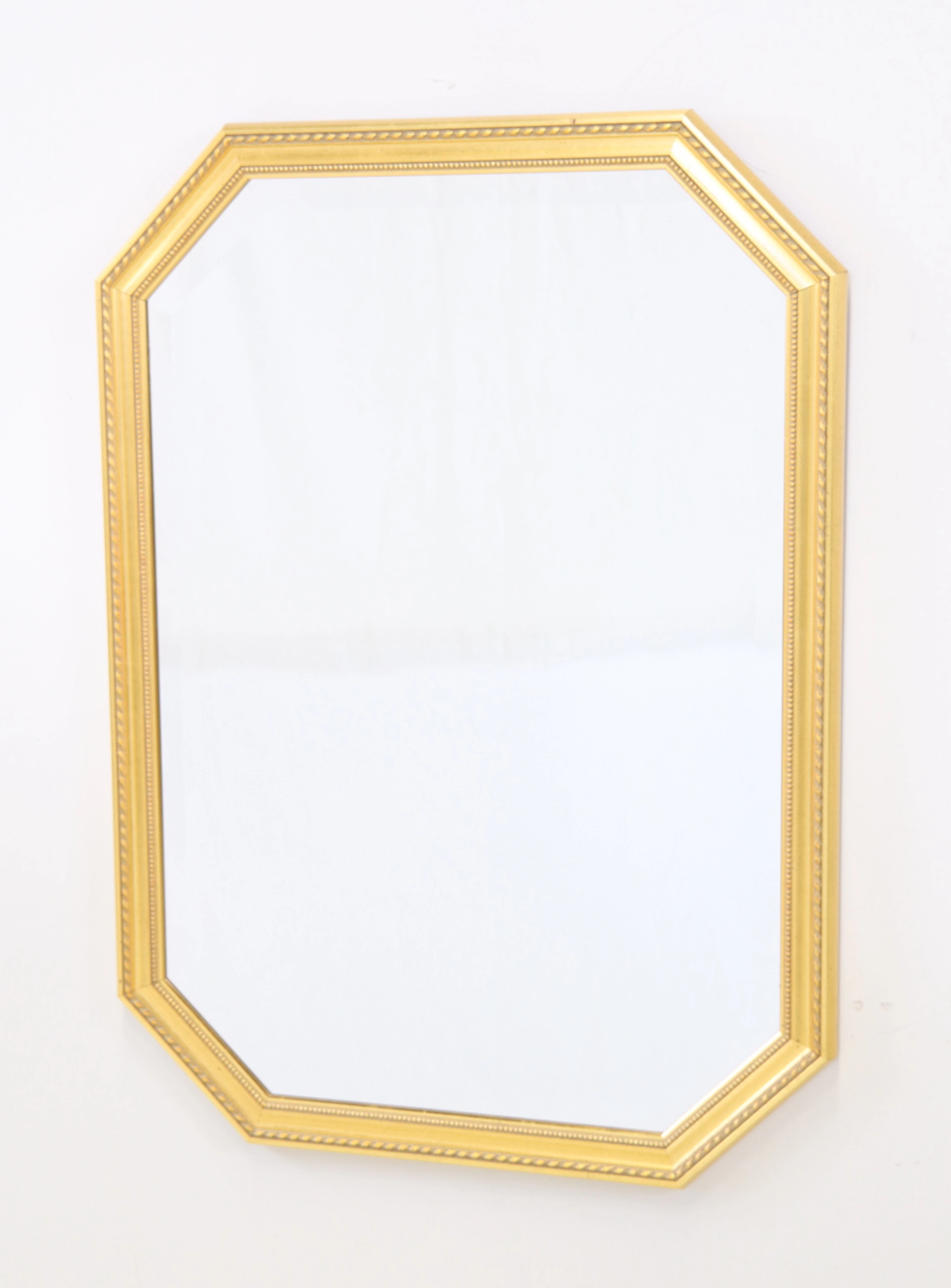 Specchio, cornice bronzata, vetro sfaccettato.