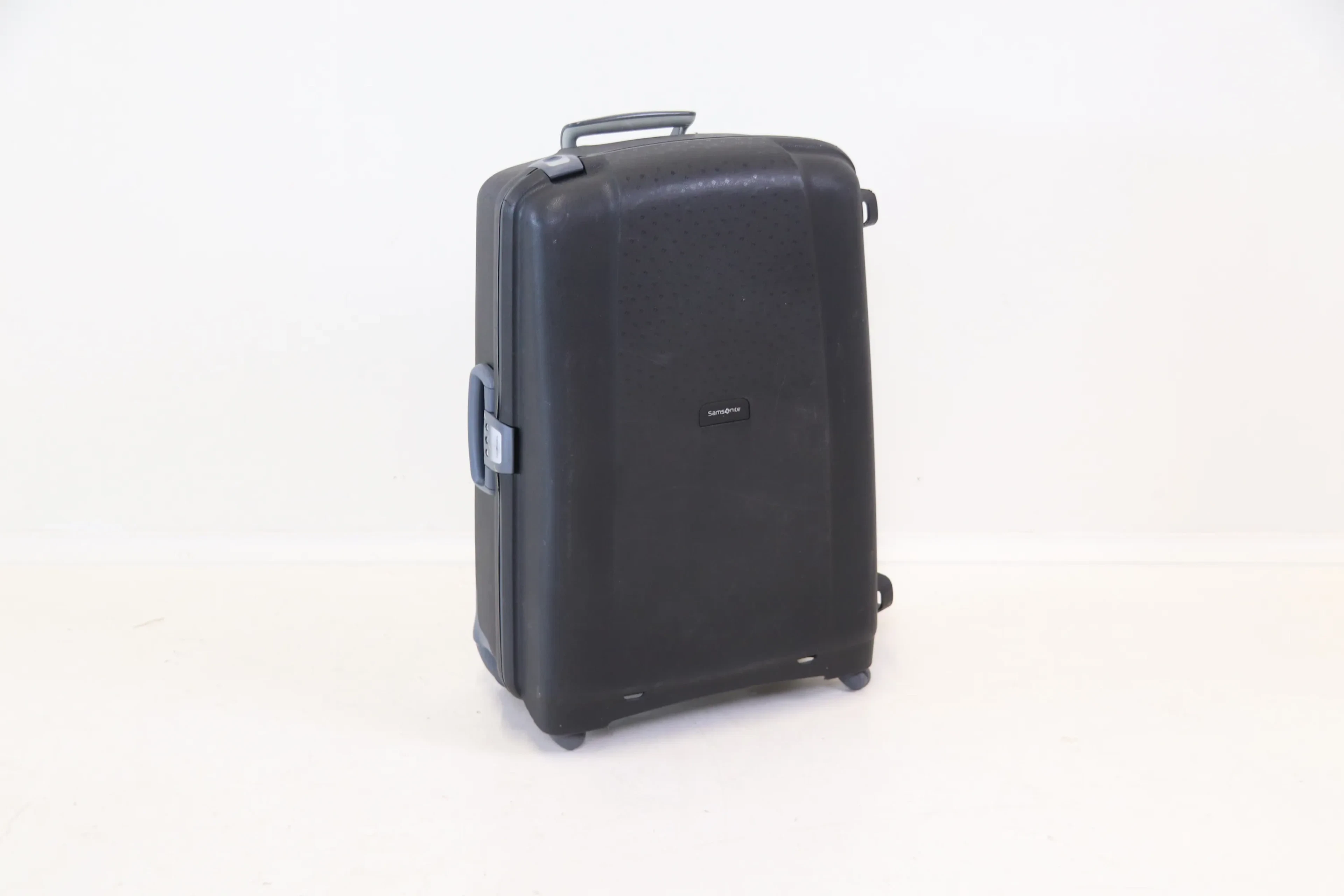 Koffer auf Rädern, Plastik, Samsonite.