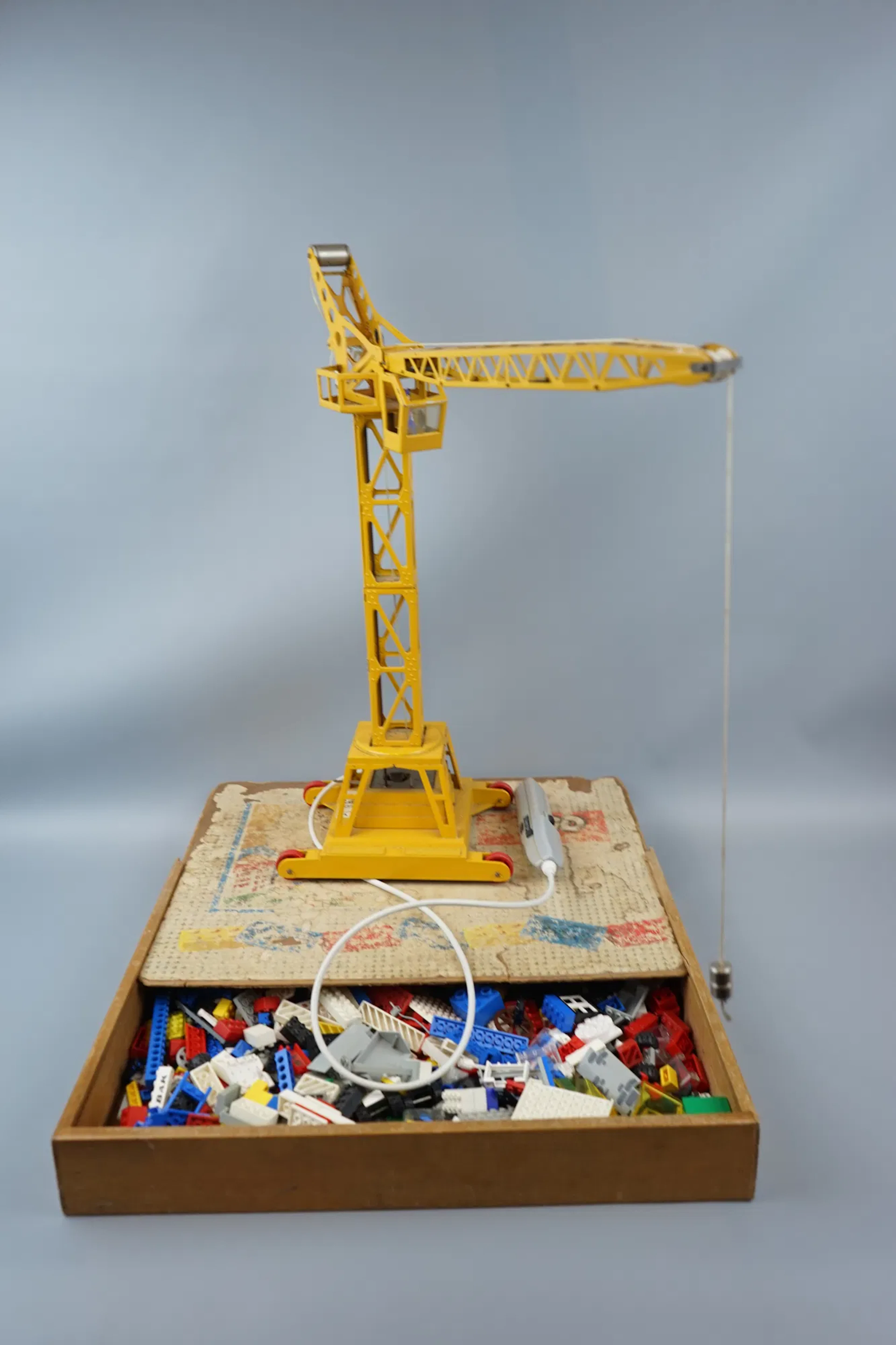 Construction crane and Lego, a lot.
