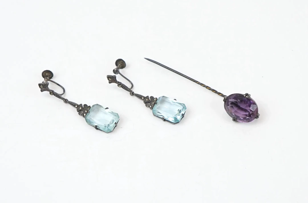 Earring, a pair and a frilly pin, silver, the first half of the 20th century.