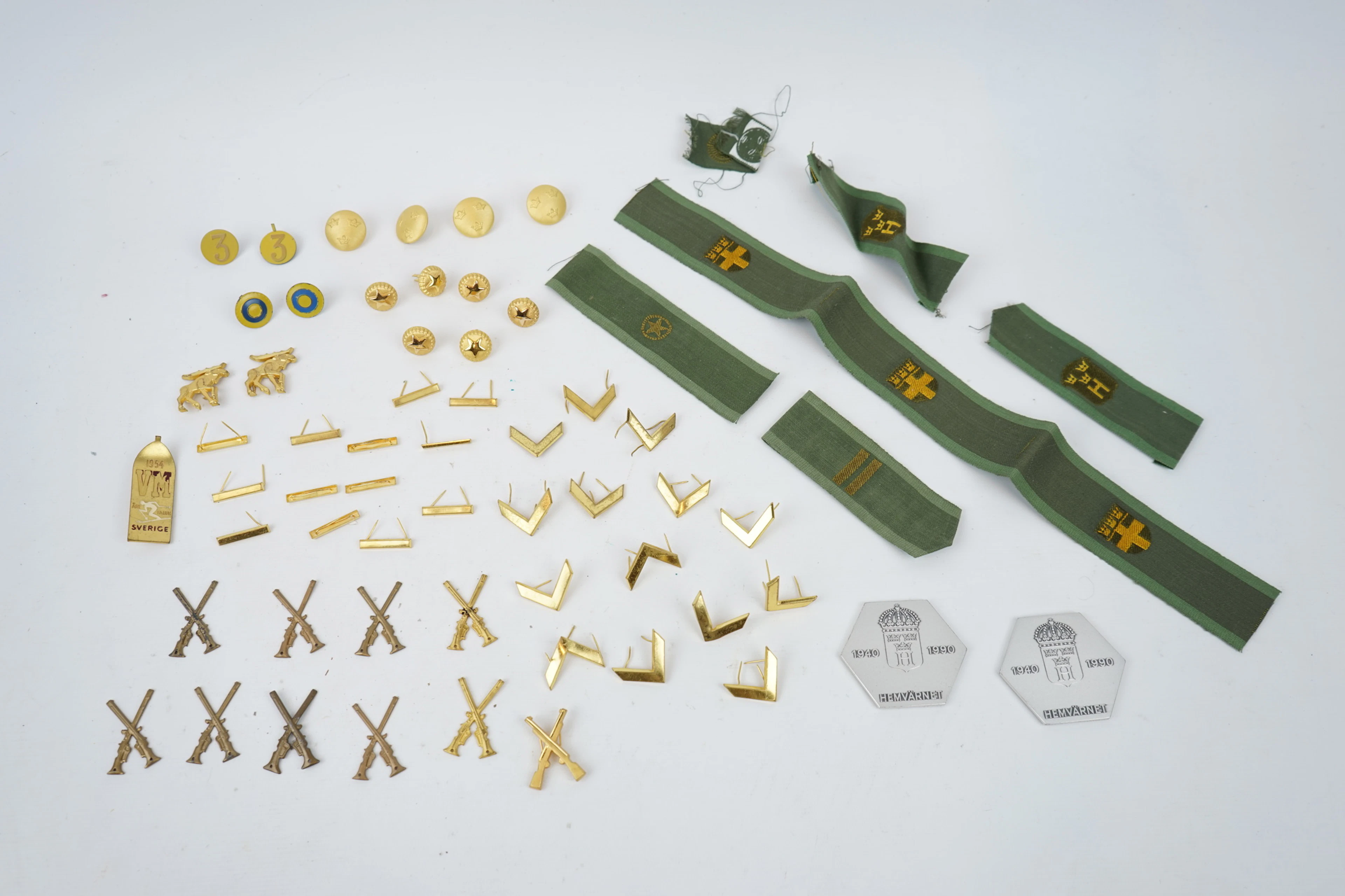 Medallas, insignias, etc., principalmente militares.