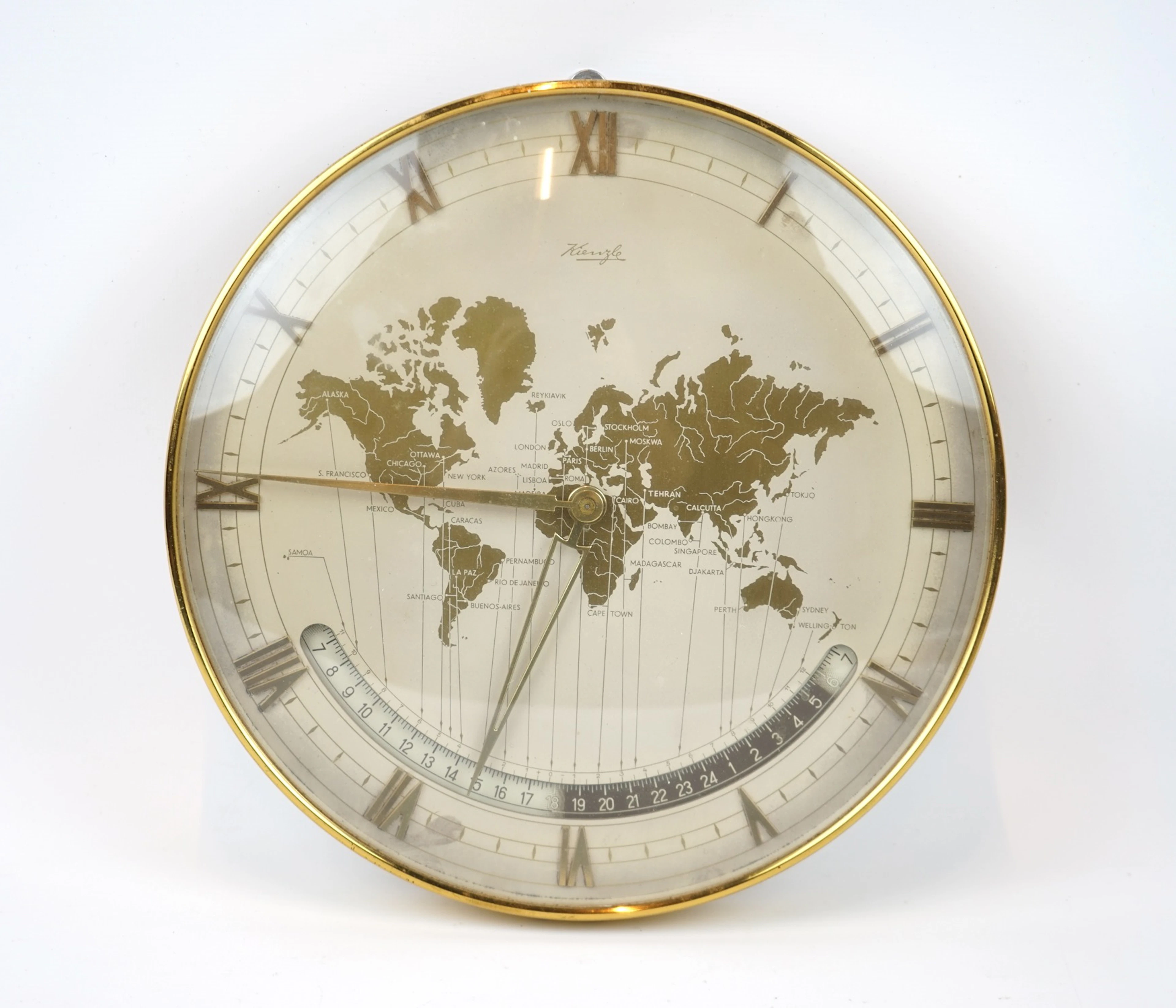 Heinrich Möller, orologio da muro in ottone/orologio mondiale, Kienzle Uhrenfabrik, Germania.