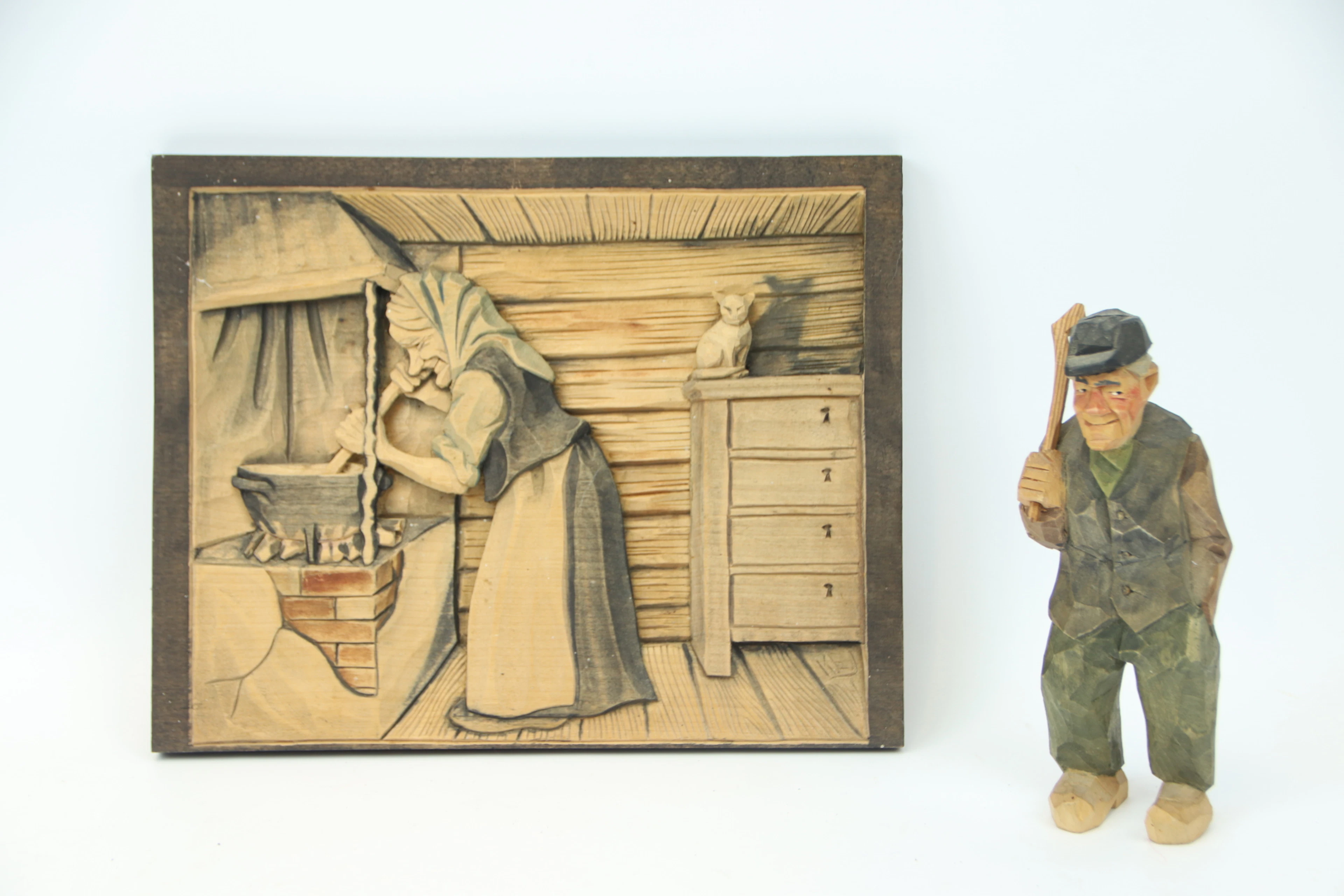 Kaj E. Jönsson, dipinto in legno, firmato KEJ, e scultura in legno firmato NG.