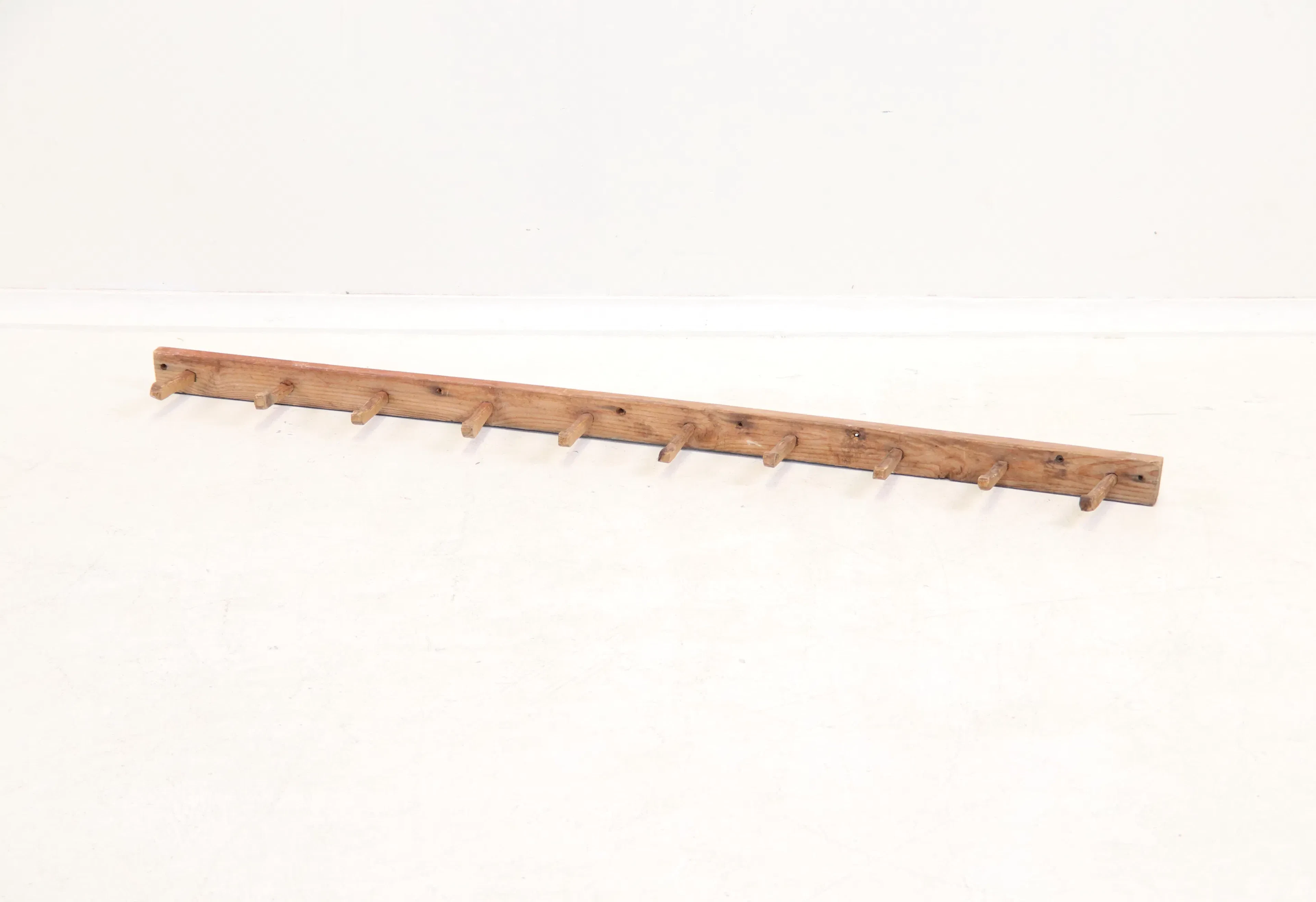 Gruccia di legno.