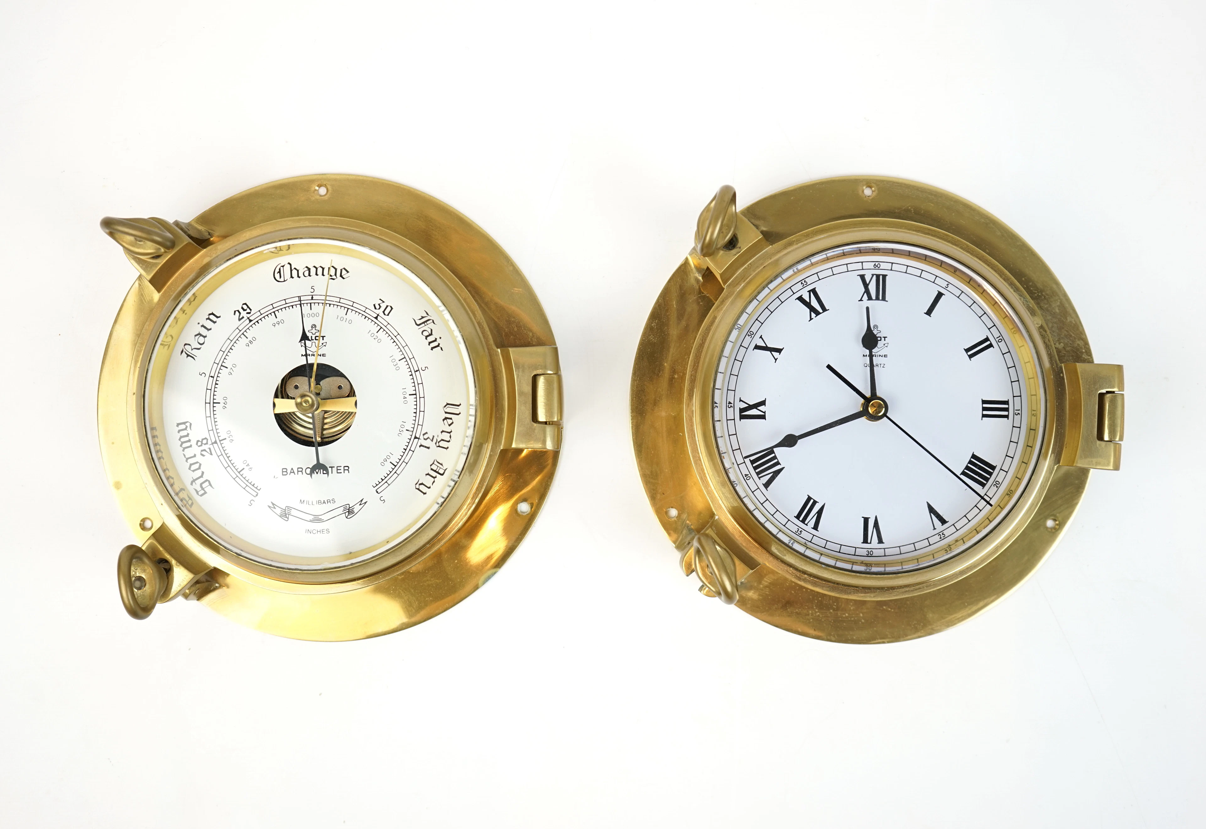 Barómetro y reloj, latón, Piloto Marino.