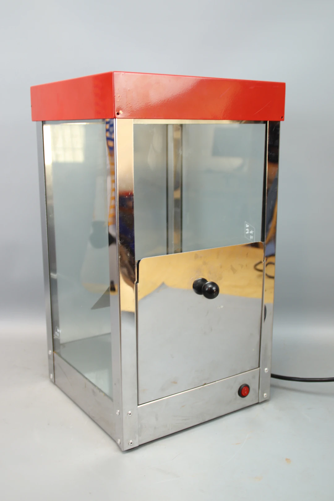 Heating cabinet for popcorn, glass/metal.