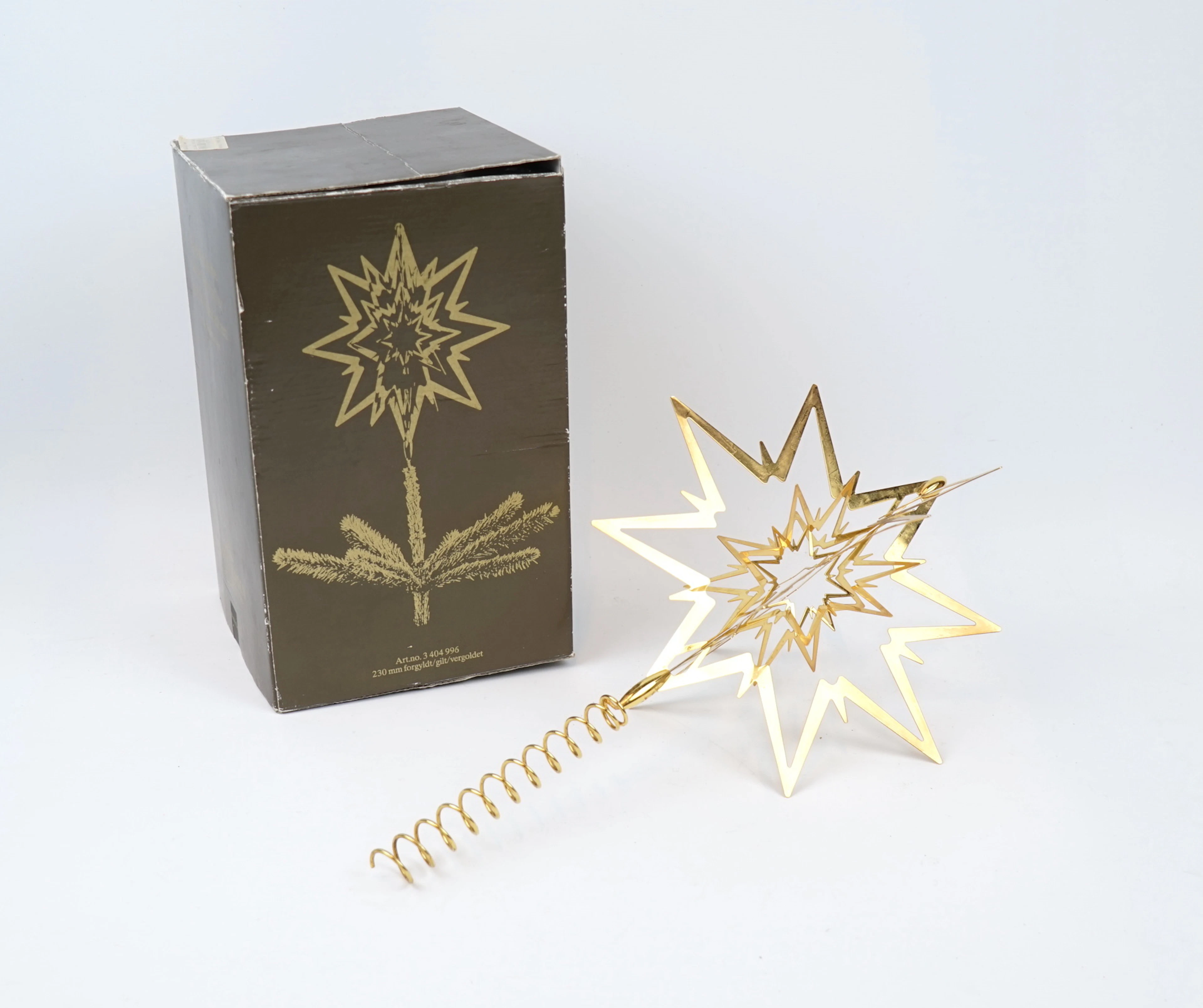 Flemming Eskildsen, top star, gilded metal, Georg Jensen, Denmark.