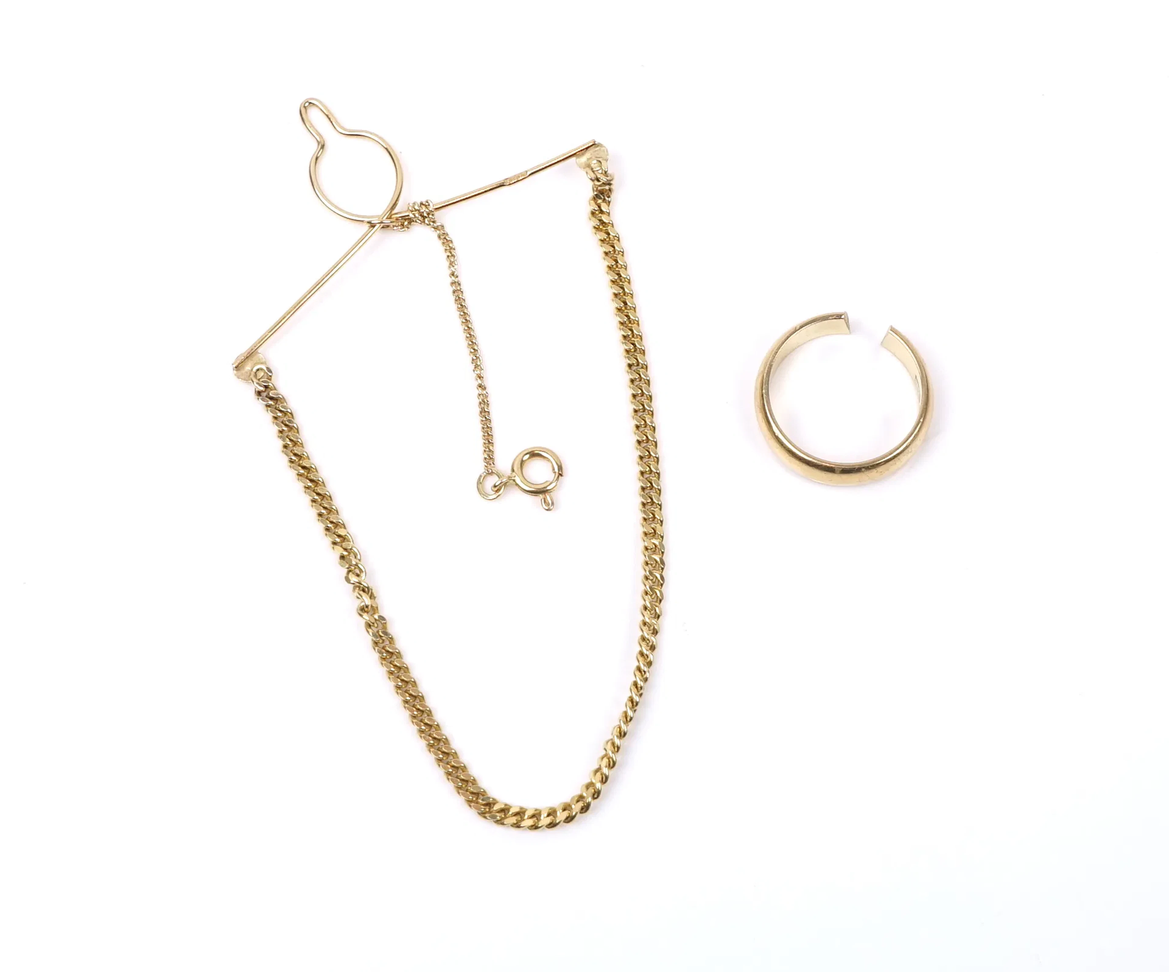 Pinza y anillo para corbata, oro de 18 quilates.