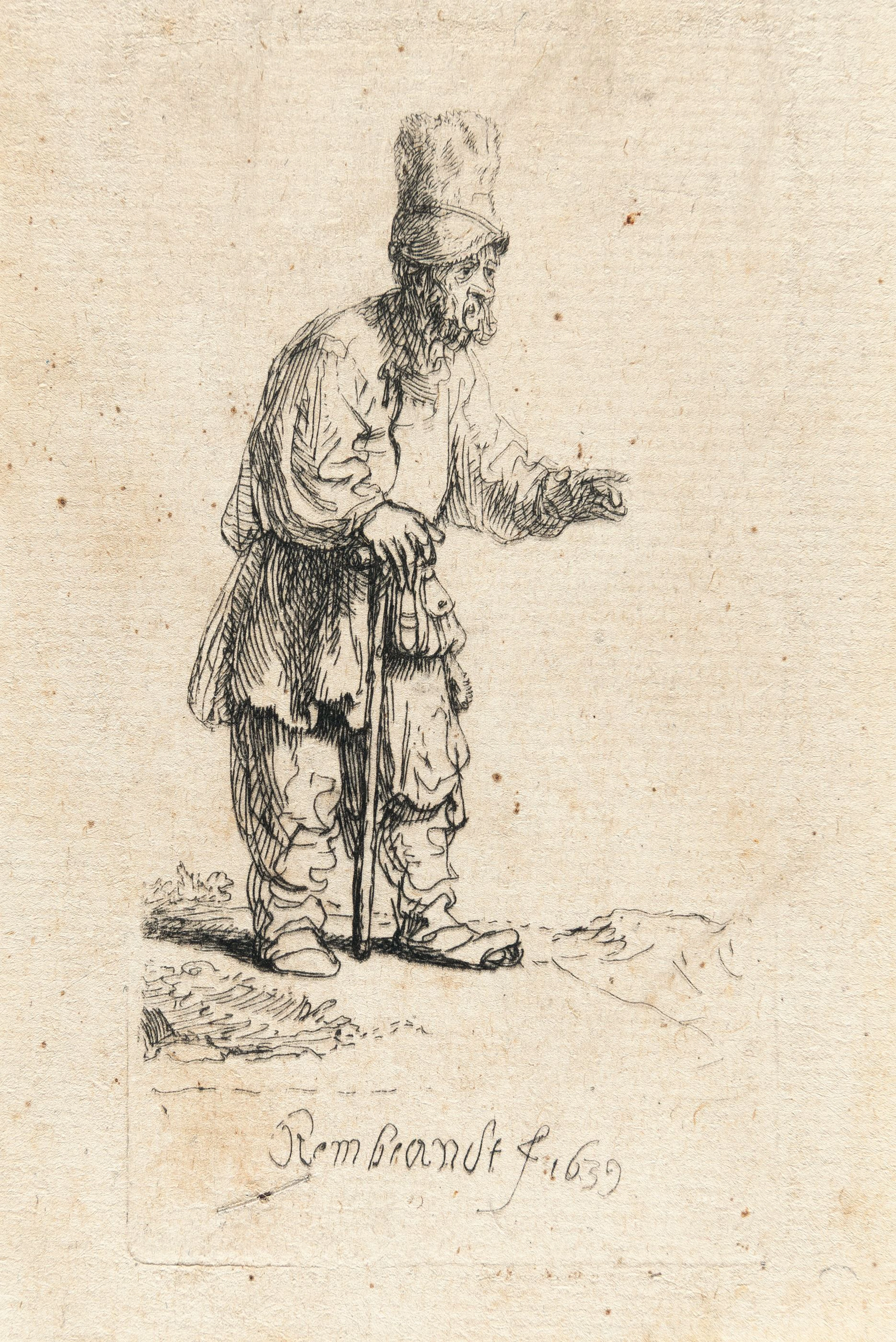 A Peasant in a High Cap, Standing Leaning on a Stick Rembrandt Harmensz.