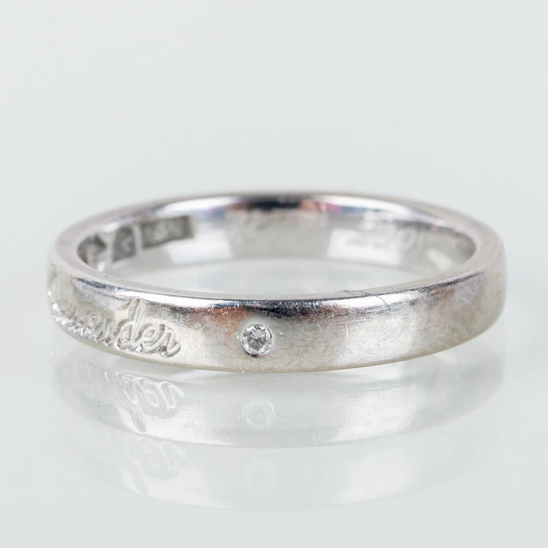 RING, 18k white gold, with two small diamonds
