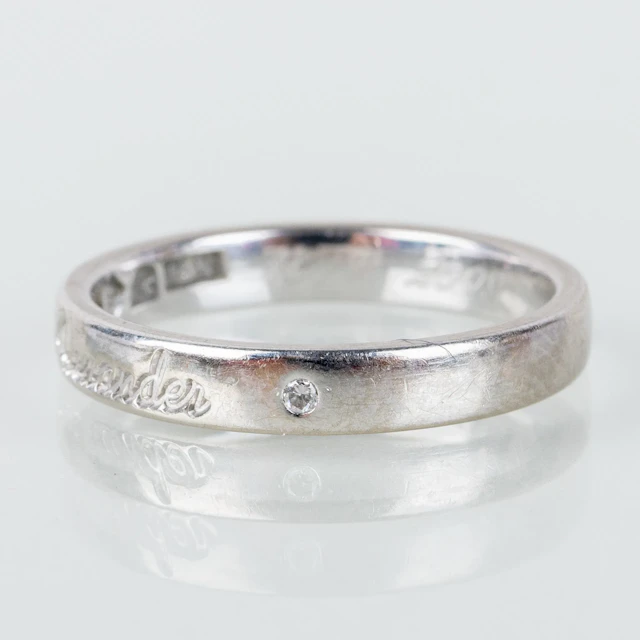 RING, 18k white gold, with two small diamonds